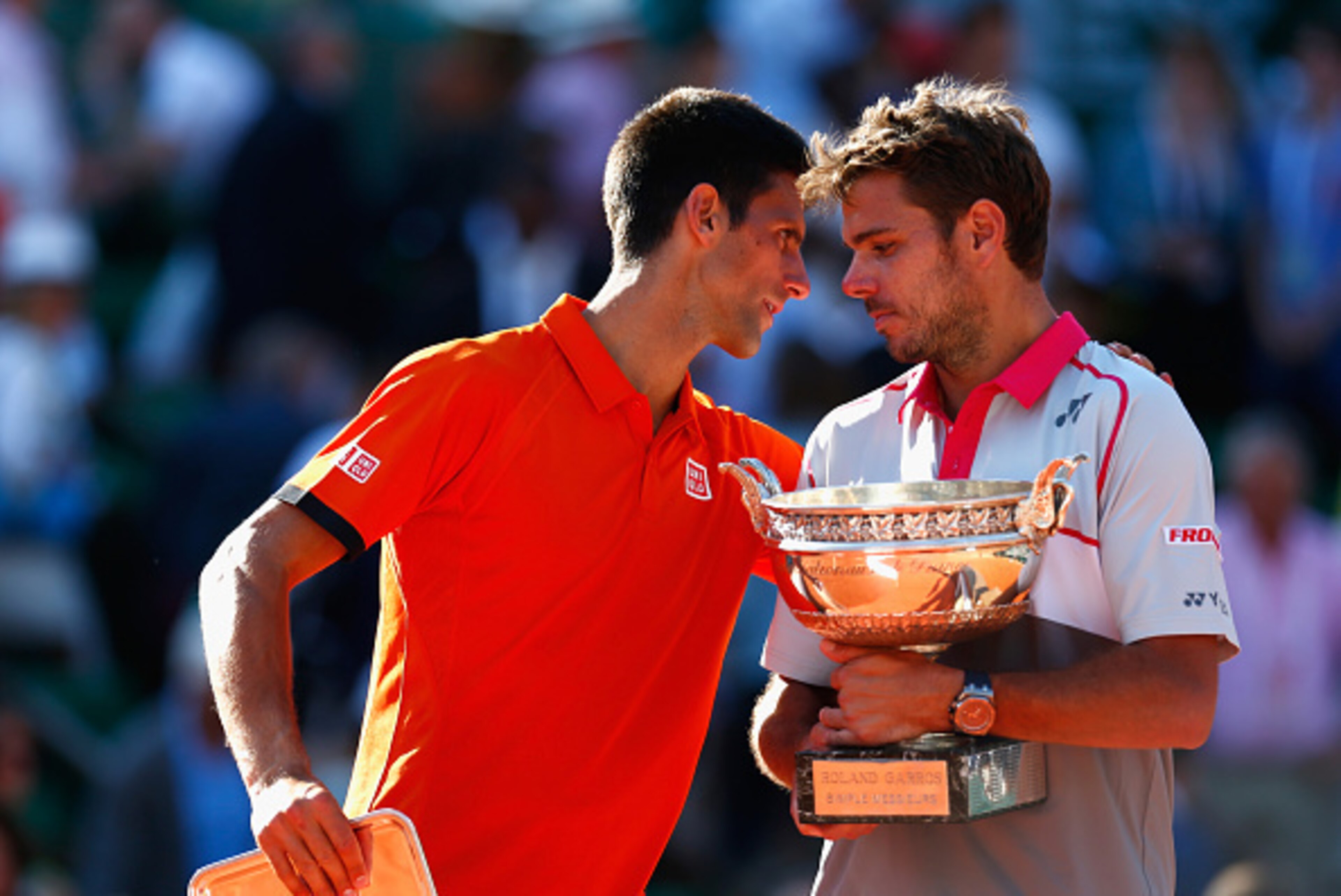 PARIS, FRANCE - JUNE 07:  Runner up Novak Djokovic of Serbia congratulates winner Stanislas Wawrinka of Switzerland after their Men's Singles Final on day fifteen of the 2015 French Open at Roland Garros on June 7, 2015 in Paris, France.  (Photo by Julian
