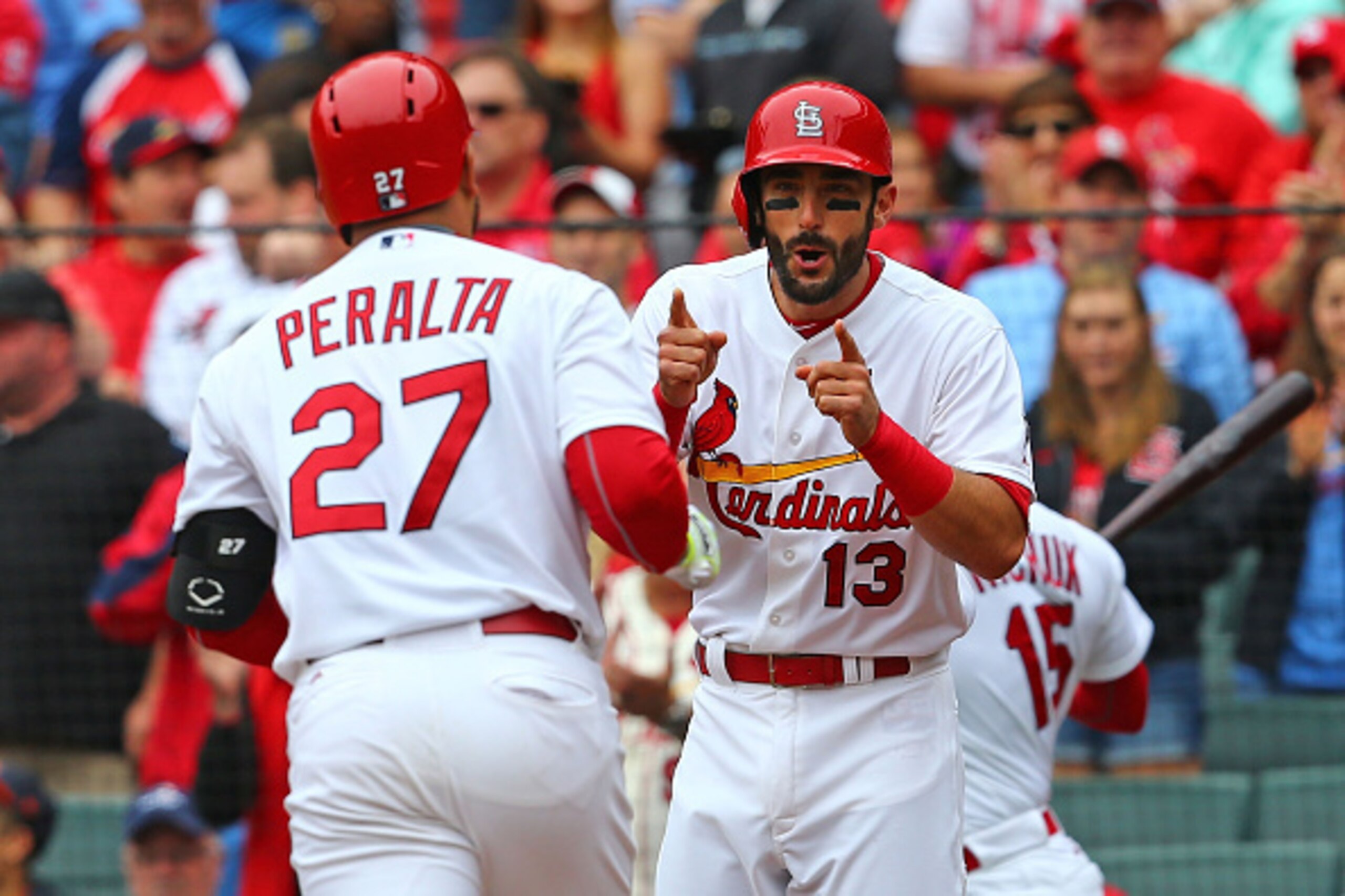 ST. LOUIS, MO - MAY 31: Matt Carpenter #13 of the St. Louis Cardinals congratulates Jhonny Peralta #27 of the St. Louis Cardinals after Peralta hits a two-run home run against the Los Angeles Dodgers in the first inning at Busch Stadium on May 31, 2015 in ST. LOUIS, MO - MAY 31: Matt Carpenter #13 of the St. Louis Cardinals congratulates Jhonny Peralta #27 of the St. Louis Cardinals after Peralta hits a two-run home run against the Los Angeles Dodgers in the first inning at Busch Stadium on May 31, 2015 in
