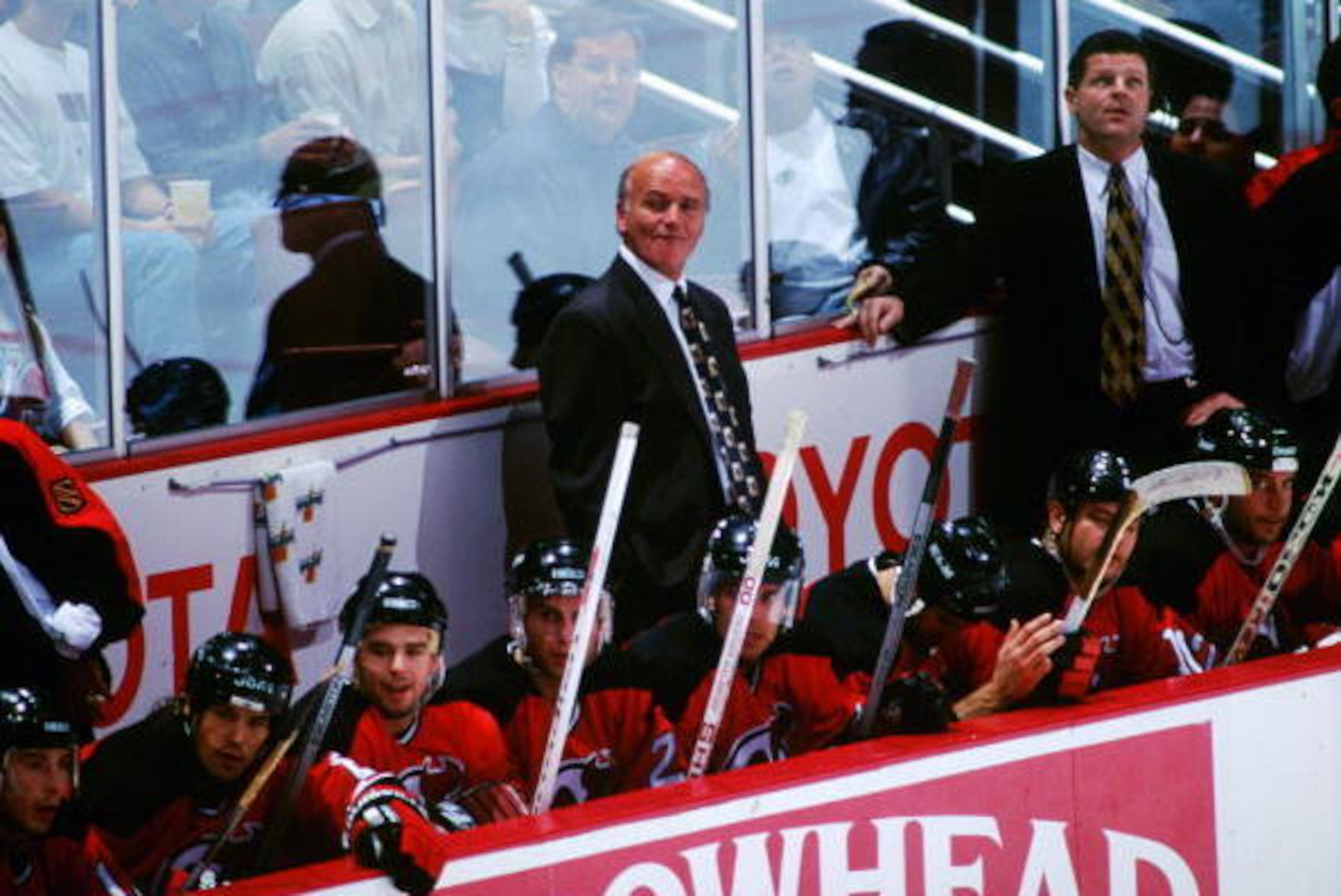 5 NOV 1995:  COACH JACQUES LAMAIRE STANDS BEHIND THE BENCH DURING THE THIRD PERIOD OF A 6-1 LOSS TO THE MIGHTY DUCKS AT THE POND IN ANAHEIM, CALIFORNIA.  AT RIGHT IS DEVIL''S ASSISTANT COACH CHRIS NILAN. Mandatory Credit: Glenn Cratty/ALLSPORT