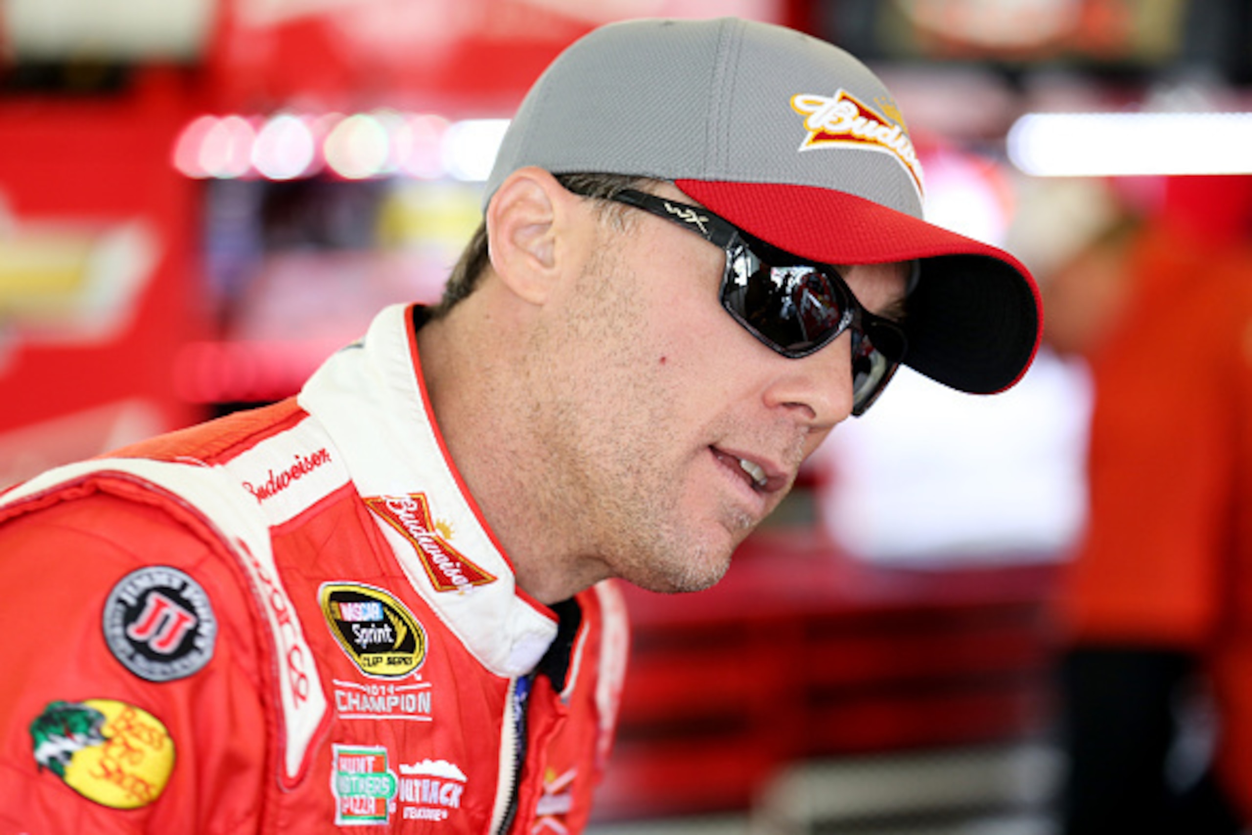 LONG POND, PA - JUNE 06:  Kevin Harvick, driver of the #4 Budweiser/Jimmy John's Chevrolet, looks on in the garage area during practice for the NASCAR Sprint Cup Series Axalta 'We Paint Winners' 400 at Pocono Raceway on June 6, 2015 in Long Pond, Pennsylv