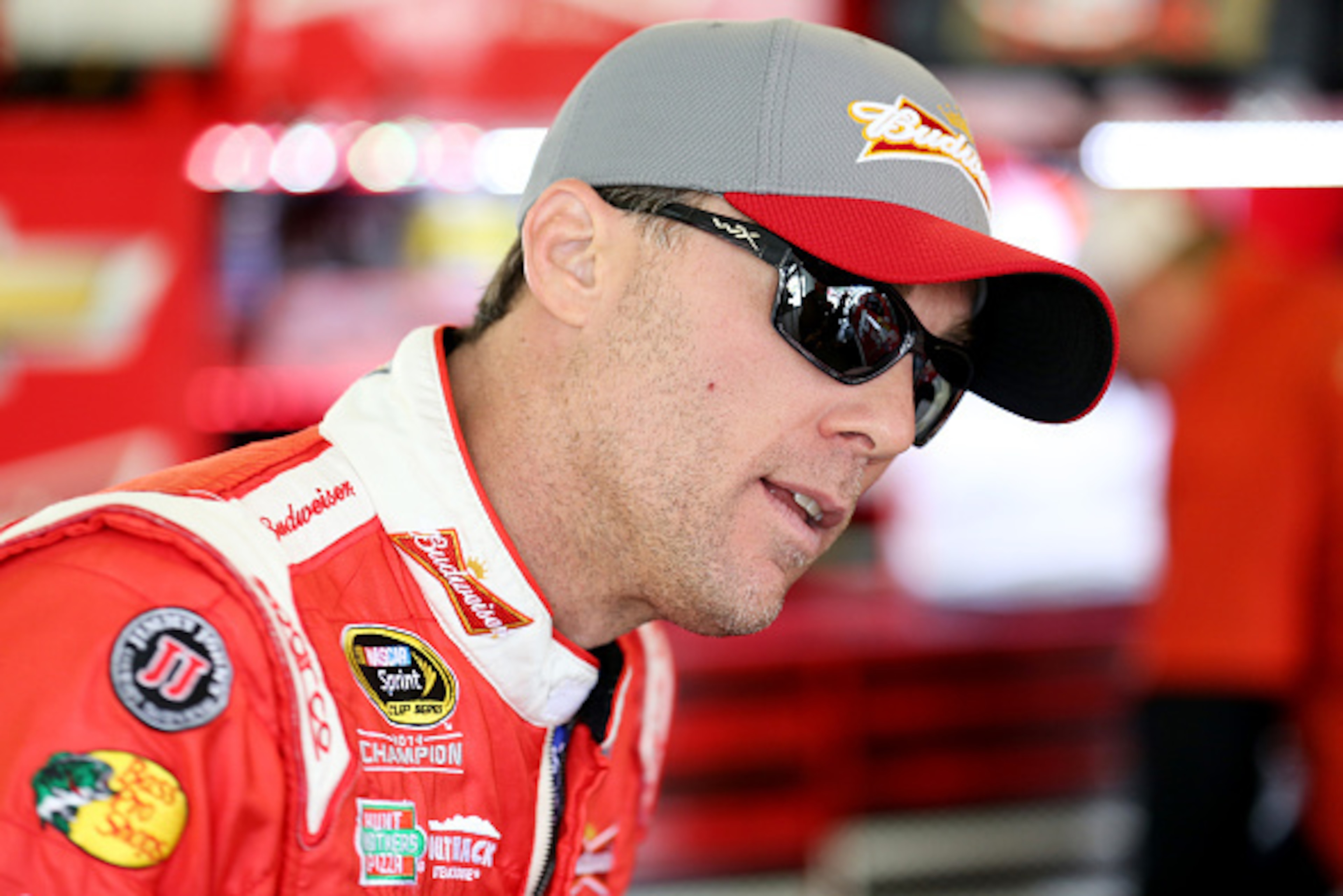 LONG POND, PA - JUNE 06:  Kevin Harvick, driver of the #4 Budweiser/Jimmy John's Chevrolet, looks on in the garage area during practice for the NASCAR Sprint Cup Series Axalta 'We Paint Winners' 400 at Pocono Raceway on June 6, 2015 in Long Pond, Pennsylv