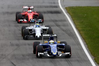 MONTREAL, QC - JUNE 07:  Marcus Ericsson of Sweden and Sauber F1 is pursued by Felipe Massa of Brazil and Williams and Sebastian Vettel of Germany and Ferrari during the Canadian Formula One Grand Prix at Circuit Gilles Villeneuve on June 7, 2015 in Montr
