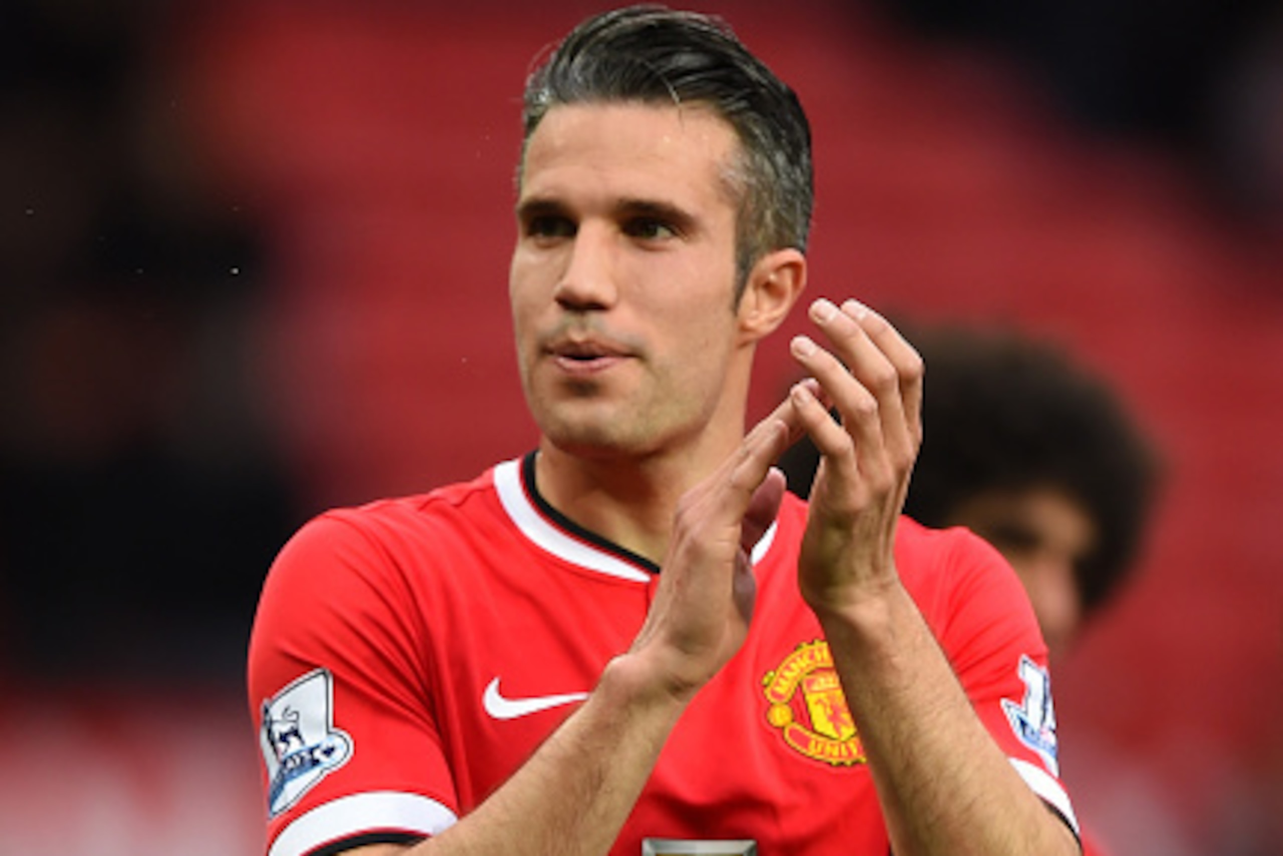 MANCHESTER, ENGLAND - MAY 17:  Robin van Persie of Manchester United applauds the crowd after the Barclays Premier League match between Manchester United and Arsenal at Old Trafford on May 17, 2015 in Manchester, England.  (Photo by Shaun Botterill/Getty 
