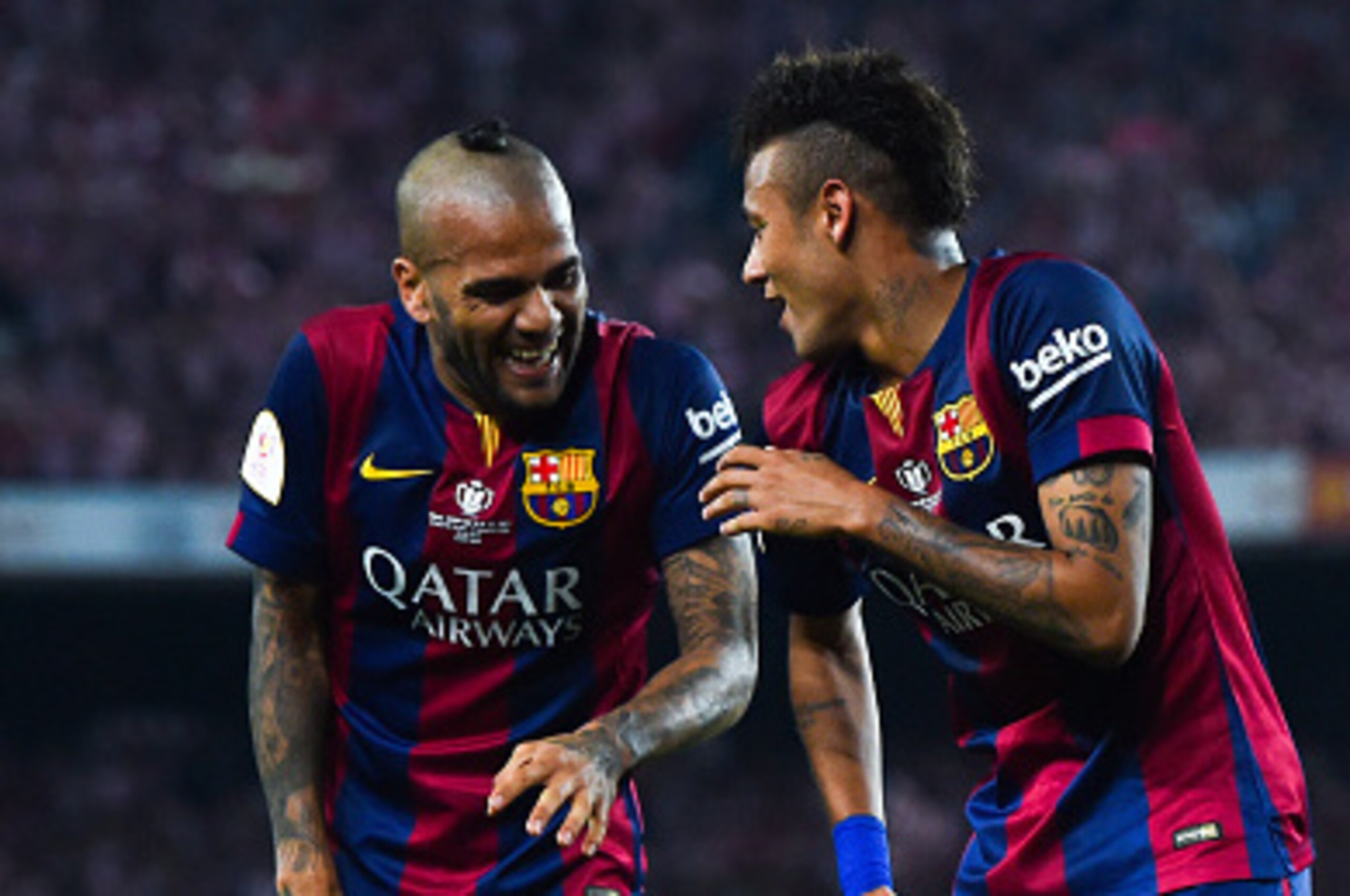 BARCELONA, SPAIN - MAY 30:  Neymar of FC Barcelona celebrates with his teammate Dani Alves after scoring his team's second goal during the Copa del Rey Final match between FC Barcelona and Athletic Club at Camp Nou on May 30, 2015 in Barcelona, Spain.  (P