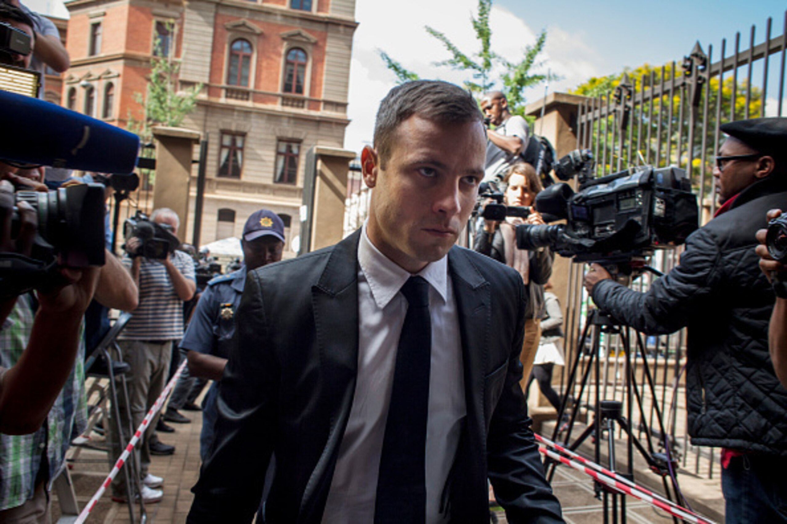 PRETORIA, SOUTH AFRICA - OCTOBER 16:  Oscar Pistorius arrives for the fourth day of sentencing at North Gauteng High Court on October 16, 2014 in Pretoria, South Africa. Pistorius will be sentenced having been found guilty of the culpable homicide of his 