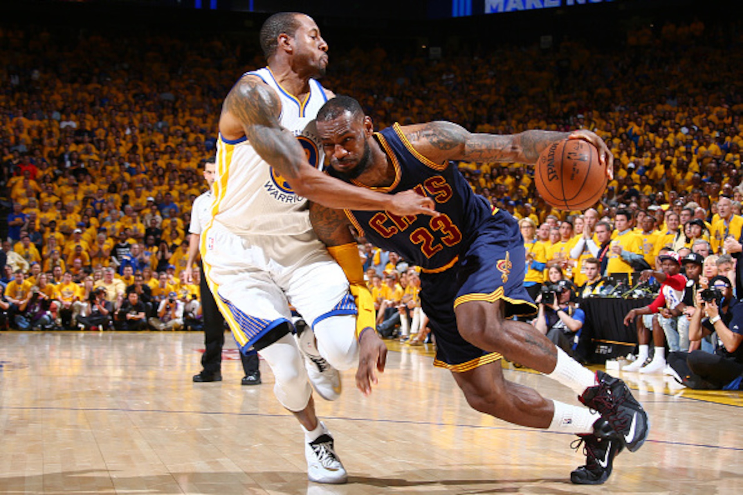 OAKLAND, CA - JUNE 7: LeBron James #23 of the Cleveland Cavaliers drives against Andre Iguodala #9 of the Golden State Warriors during Game Two of the 2015 NBA Finals on June 7, 2015 at Oracle Arena in Oakland, California. NOTE TO USER: User expressly ack