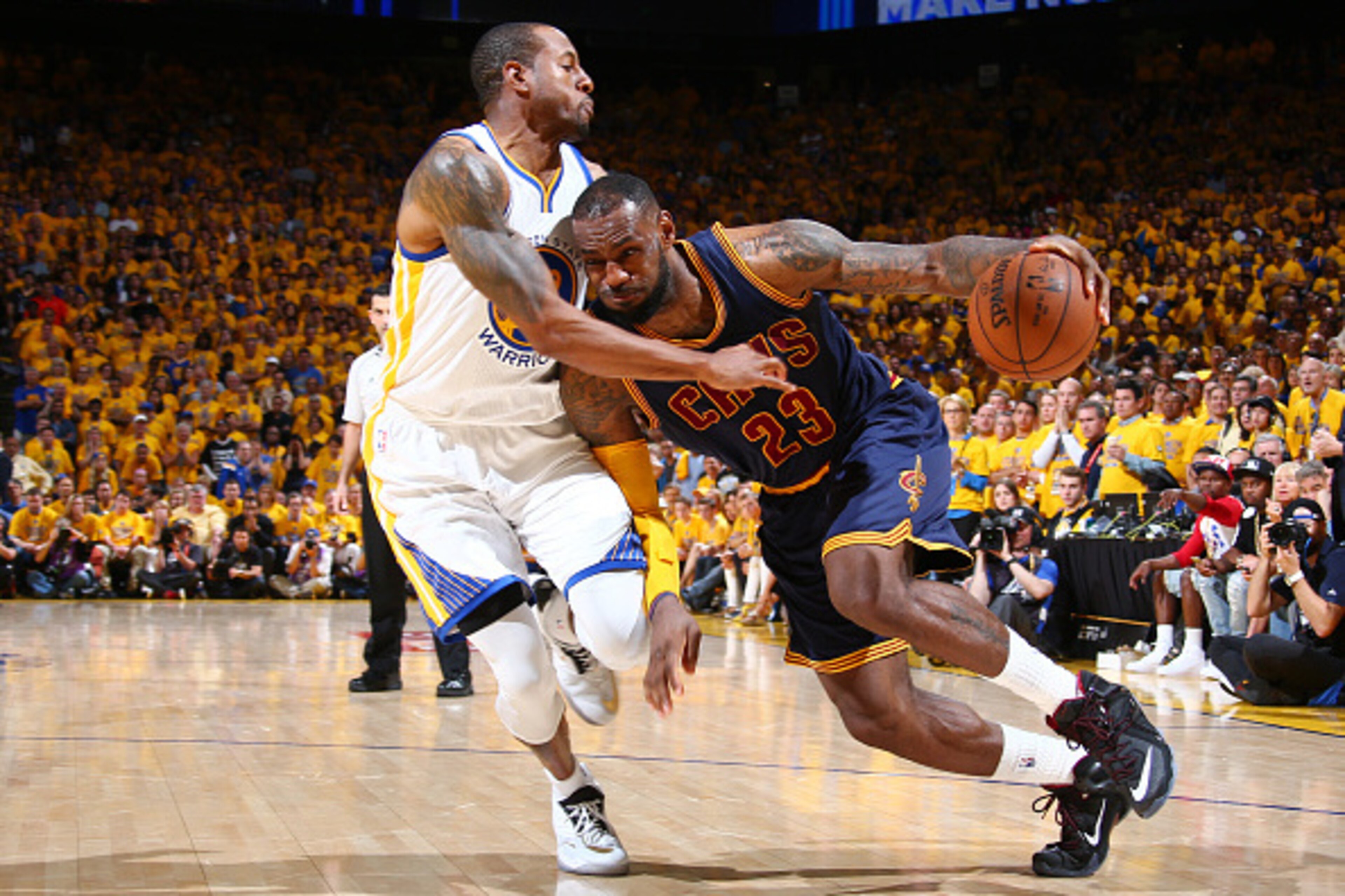 OAKLAND, CA - JUNE 7: LeBron James #23 of the Cleveland Cavaliers drives against Andre Iguodala #9 of the Golden State Warriors during Game Two of the 2015 NBA Finals on June 7, 2015 at Oracle Arena in Oakland, California. NOTE TO USER: User expressly ack
