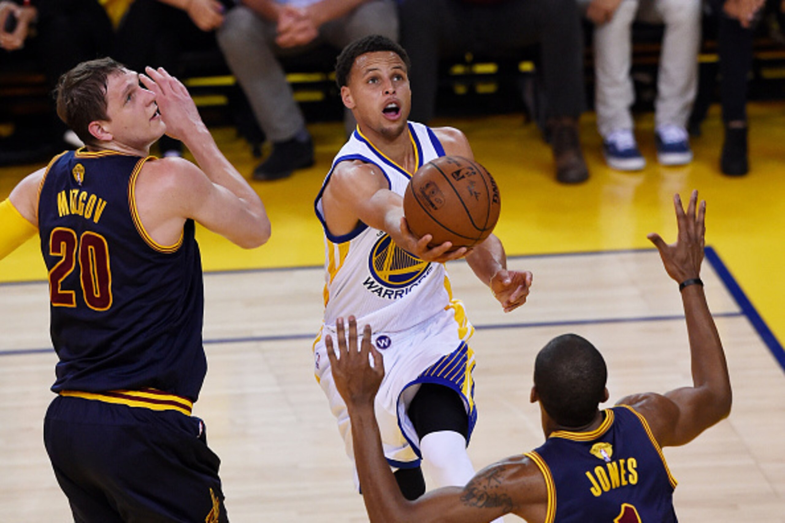 OAKLAND, CA - JUNE 07:  Stephen Curry #30 of the Golden State Warriors shoots against James Jones #1 and Timofey Mozgov #20 of the Cleveland Cavaliers in the first quarter during Game Two of the 2015 NBA Finals at ORACLE Arena on June 7, 2015 in Oakland, 