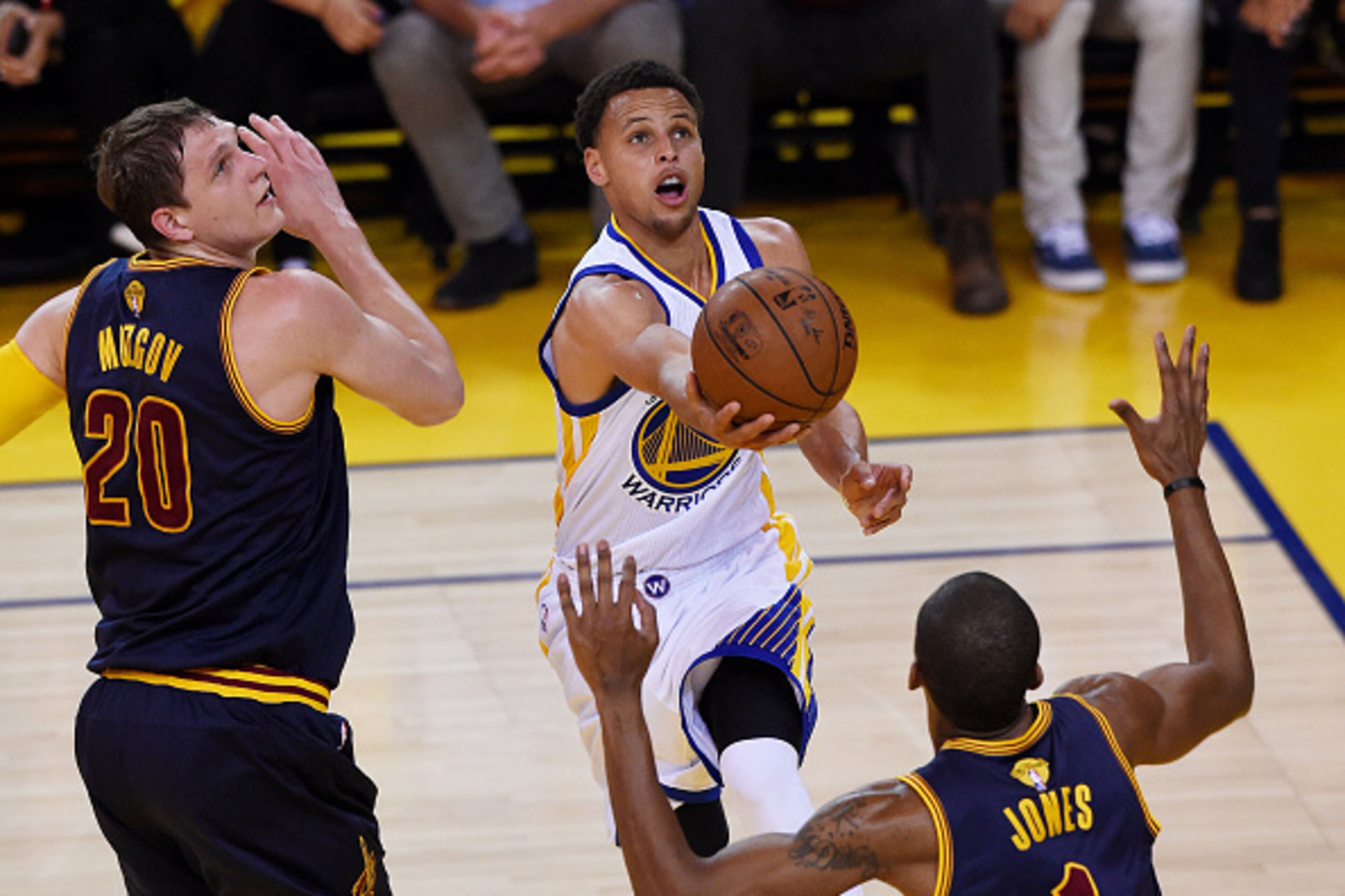 OAKLAND, CA - JUNE 07:  Stephen Curry #30 of the Golden State Warriors shoots against James Jones #1 and Timofey Mozgov #20 of the Cleveland Cavaliers in the first quarter during Game Two of the 2015 NBA Finals at ORACLE Arena on June 7, 2015 in Oakland, 