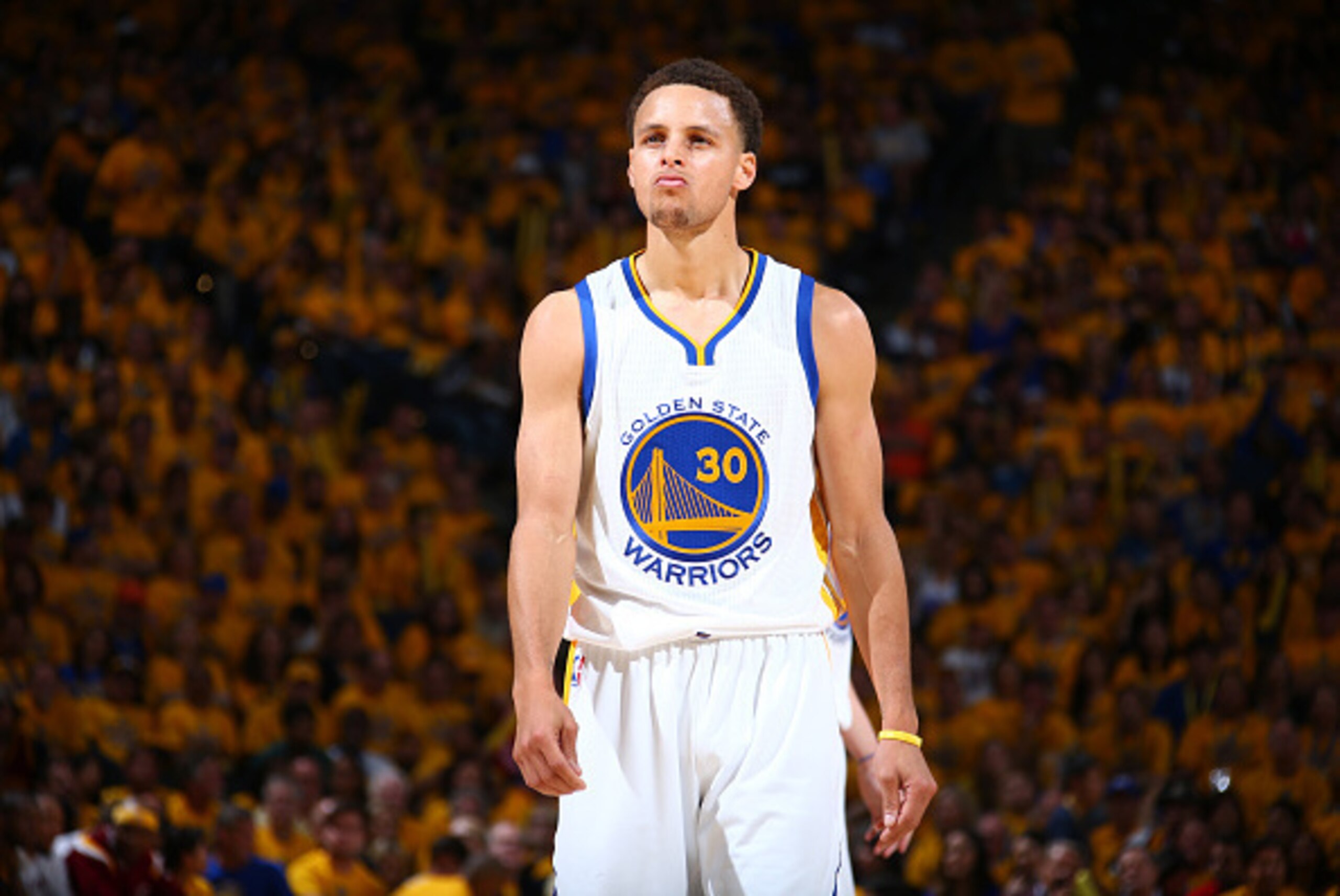 OAKLAND, CA - JUNE 7: Stephen Curry #30 of the Golden State Warriors reacts during Game Two of the 2015 NBA Finals on June 7, 2015 at Oracle Arena in Oakland, California. NOTE TO USER: User expressly acknowledges and agrees that, by downloading and or usi