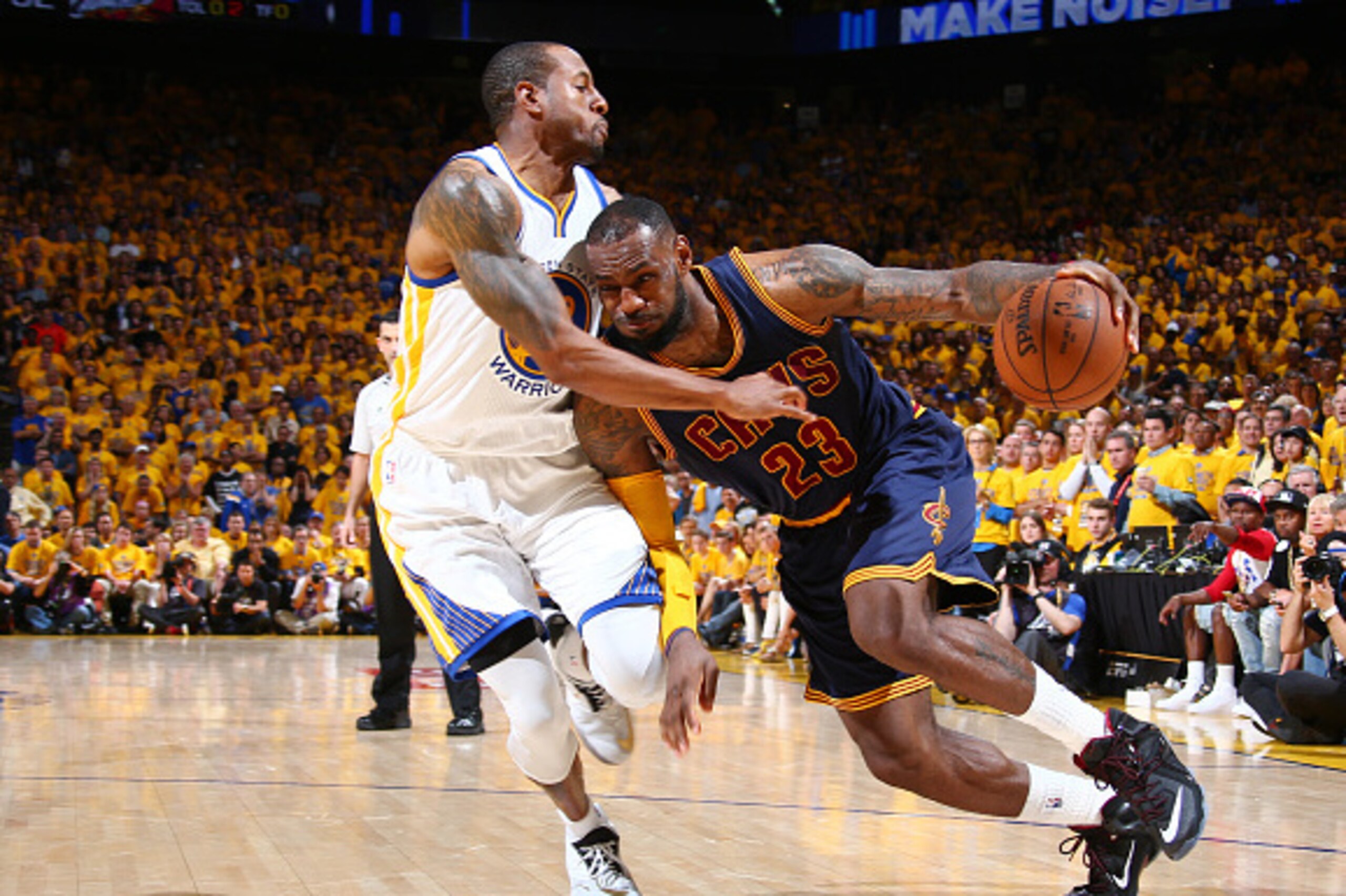 OAKLAND, CA - JUNE 7: LeBron James #23 of the Cleveland Cavaliers drives against Andre Iguodala #9 of the Golden State Warriors during Game Two of the 2015 NBA Finals on June 7, 2015 at Oracle Arena in Oakland, California. NOTE TO USER: User expressly ack