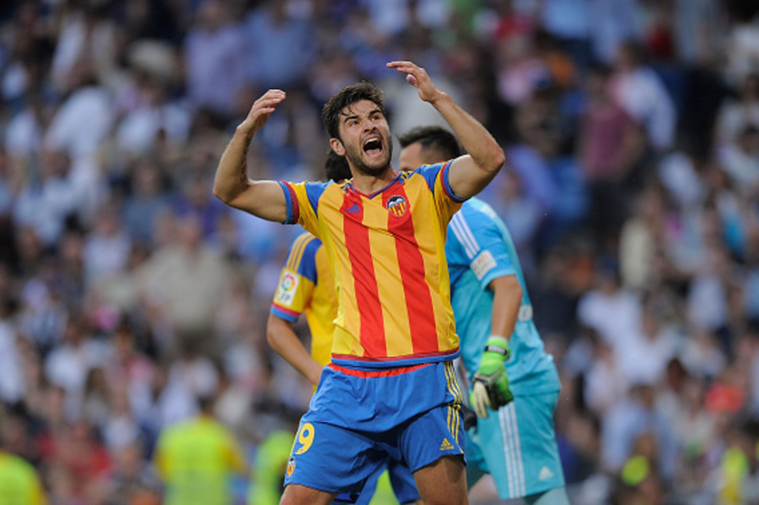MADRID, SPAIN - MAY 09: Antonio Barragan of Valencia CF celebrates after his teammate Diego Alves saved a penalty kick from Cristiano Ronaldo during the La Liga match between Real Madrid CF and Valencia CF at Estadio Santiago Bernabeu on May 9, 2015 in M MADRID, SPAIN - MAY 09: Antonio Barragan of Valencia CF celebrates after his teammate Diego Alves saved a penalty kick from Cristiano Ronaldo during the La Liga match between Real Madrid CF and Valencia CF at Estadio Santiago Bernabeu on May 9, 2015 in M