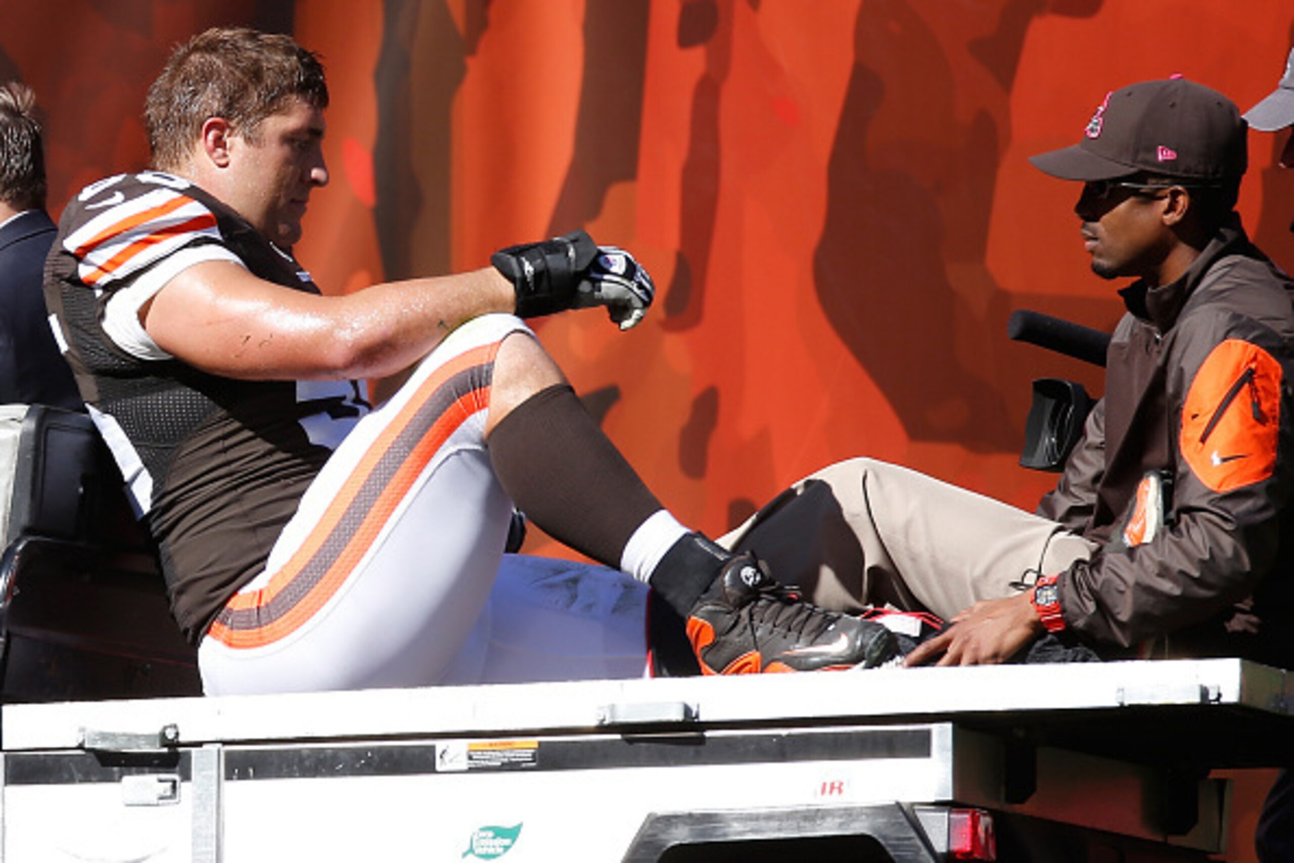 CLEVELAND, OH - OCTOBER 12:  Alex Mack #55 of the Cleveland Browns is carted off the field after being injured during the second quarter against the Pittsburgh Steelers at FirstEnergy Stadium on October 12, 2014 in Cleveland, Ohio.  (Photo by Gregory Sham