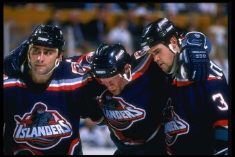 24 Nov 1995: New York Islanders players look on during a game against the Buffalo Sabres at Memorial Auditorium in Buffalo, New York.