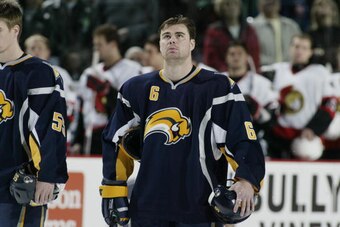BUFFALO, NY - DECEMBER 16:  Jaroslav Spacek #6 of the Buffalo Sabres stands for the National Anthem before the game against the Ottawa Senators at HSBC Arena on December 16, 2006 in Buffalo, New York. The Senators won 3-1. (Photo by Rick Stewart/Getty Ima