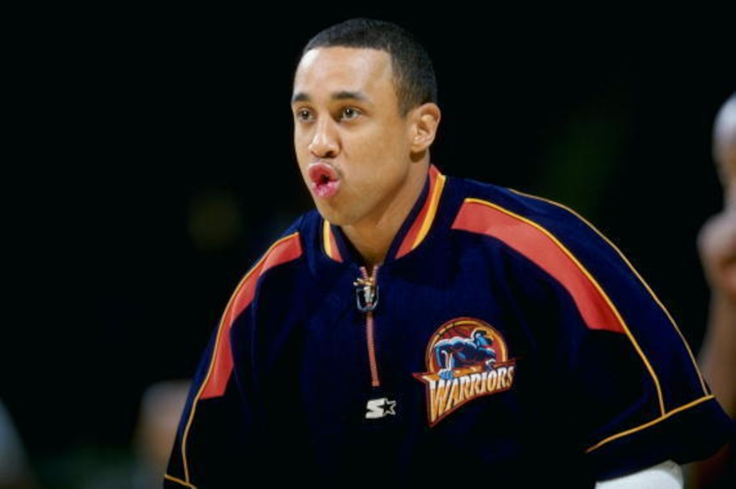 10 Feb 1999: John Starks #9 of the Golden State Warriors looks on during the game against the Seattle Supersonics at the Oakland Coliseum Arena in Oakland, California. The Sonics defeated the Warriors 89-82.  Mandatory Credit: Vincent Laforet  /Allsport