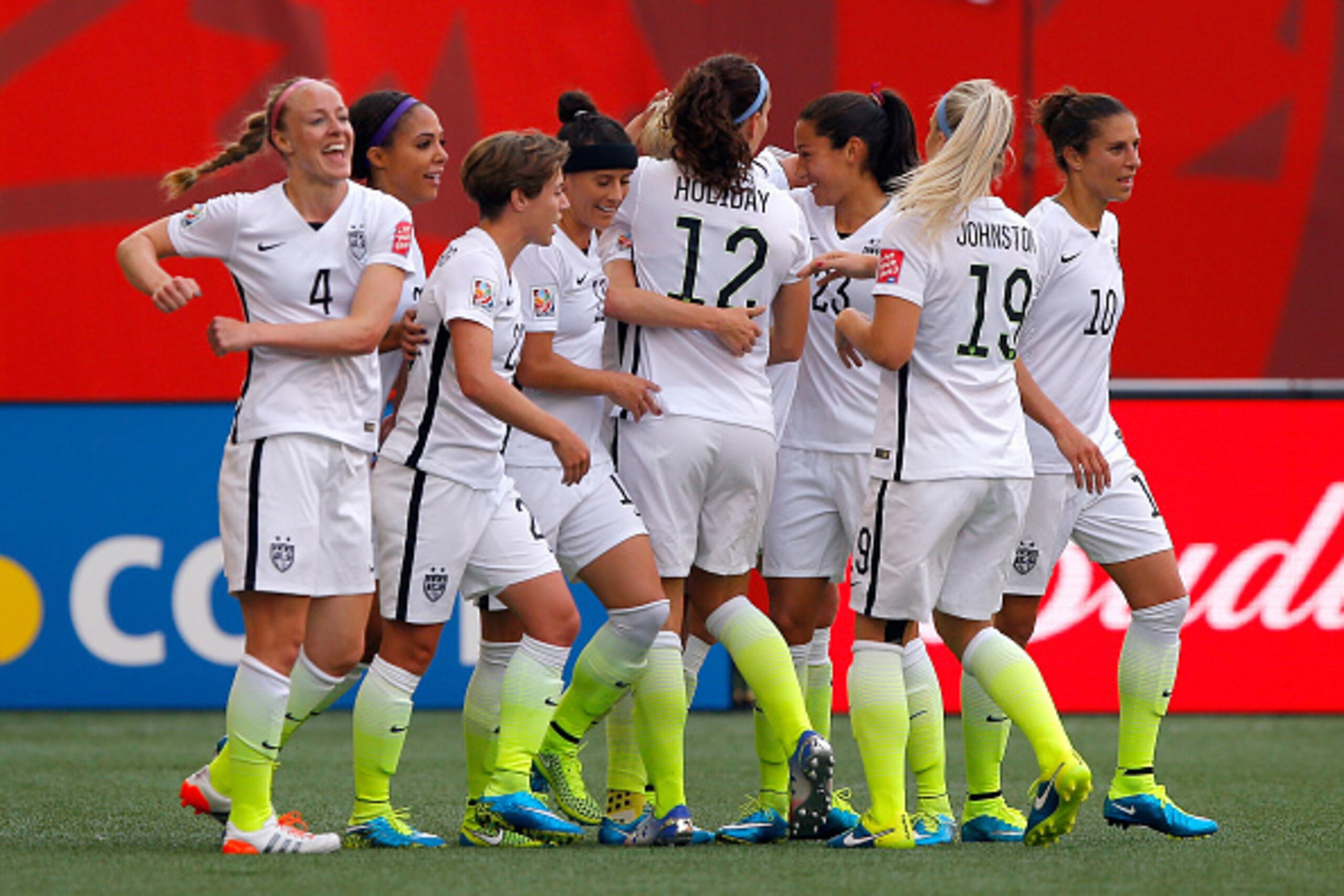 WINNIPEG, MB - JUNE 08:  Megan Rapinoe #15 of United States celebrates her opening goal with teammates against Australia in the first half during the FIFA Women's World Cup 2015 Group D match at Winnipeg Stadium on June 8, 2015 in Winnipeg, Canada.  (Phot