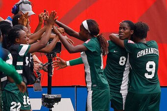 WINNIPEG, MB - JUNE 08:  Asisat Oshoala #8 of Nigeria reacts after scoring the second goal against Sweden during the FIFA Women's World Cup Canada 2015 Group D match between Sweden and Nigeria at Winnipeg Stadium on June 8, 2015 in Winnipeg, Canada.  (Pho