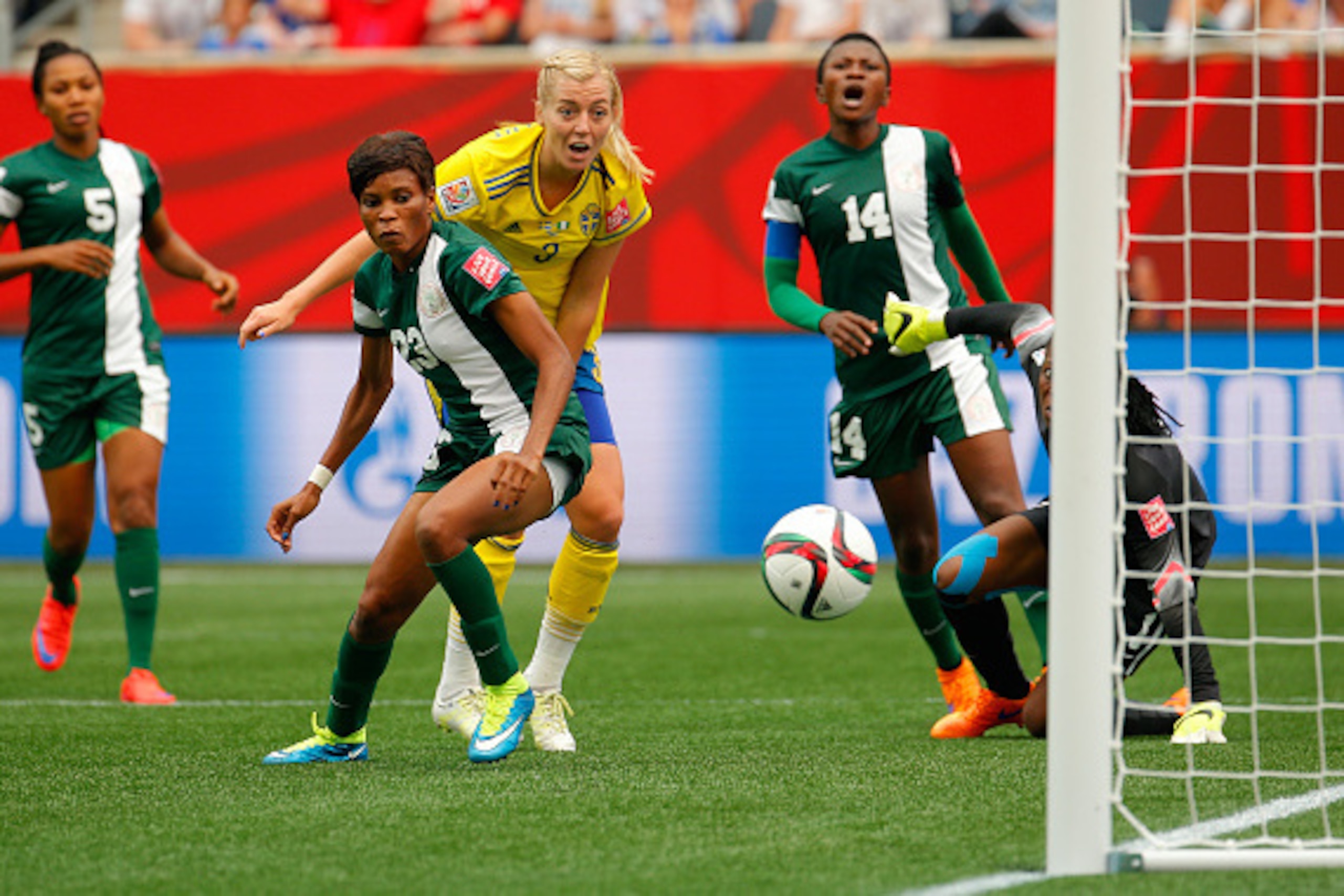 WINNIPEG, MB - JUNE 08:  Linda Sembrant #3 of Sweden scores the third goal against goalkeeper Precious Dede #1 and Ngozi Ebere #23 of Nigeria during the FIFA Women's World Cup Canada 2015 Group D match between Sweden and Nigeria at Winnipeg Stadium on Jun