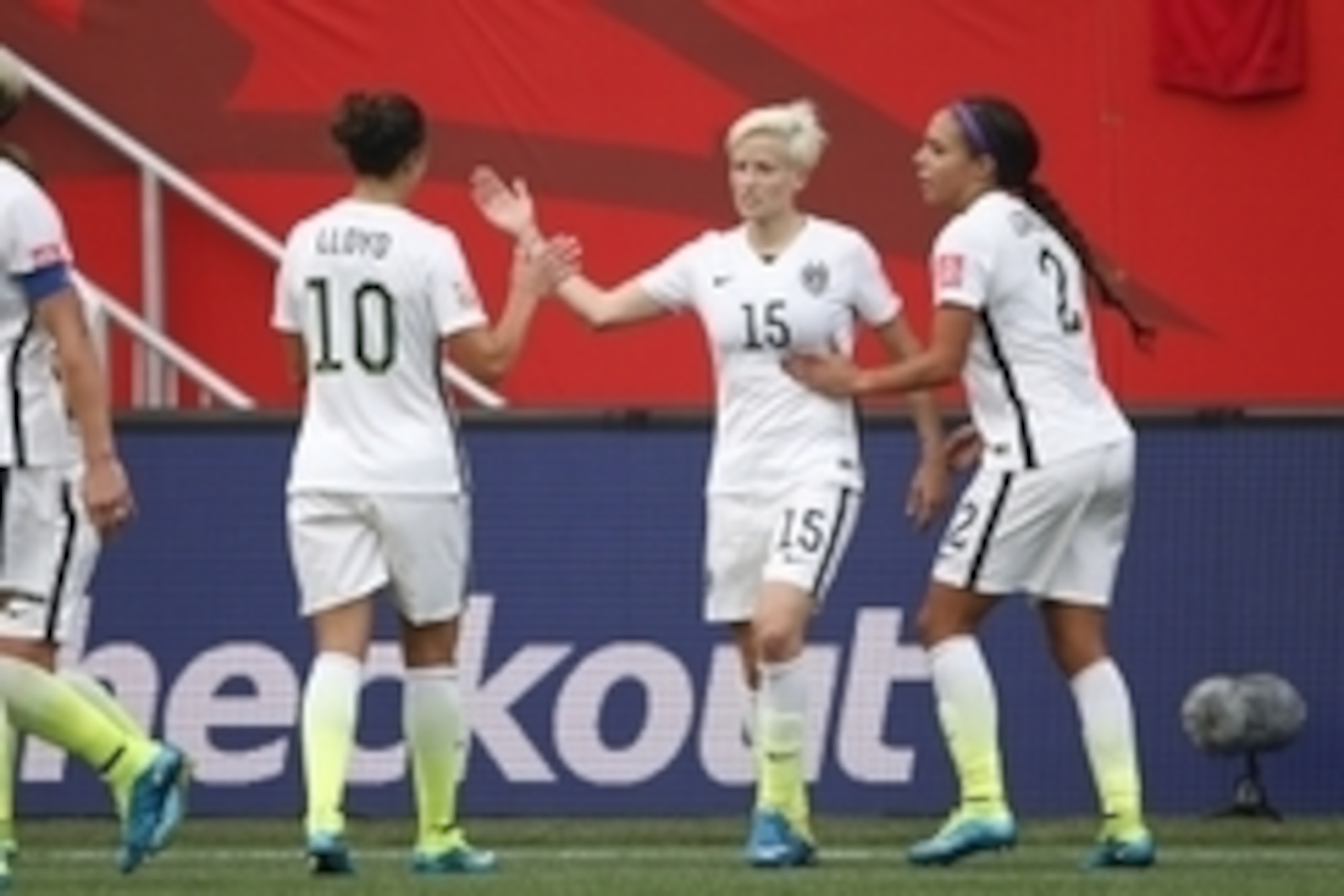 Jun 8, 2015; Winnipeg, Manitoba, CAN; United States midfielder Megan Rapinoe (15) celebrates scoring against Australia with midfielder Carli Lloyd (10) and forward Sydney Leroux (2) in a Group D soccer match in the 2015 women's World Cup at Winnipeg Stadi