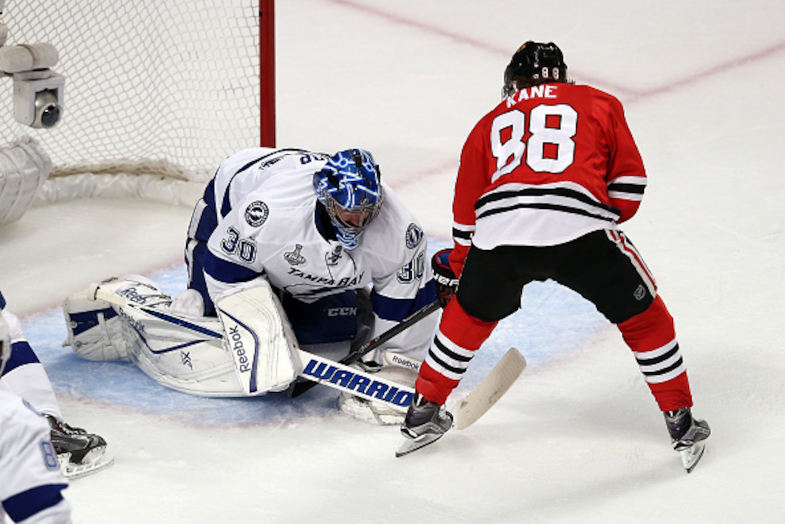 CHICAGO, IL - JUNE 08: Ben Bishop #30 of the Tampa Bay Lightning makes a save on Patrick Kane #88 of the Chicago Blackhawks during Game Three of the 2015 NHL Stanley Cup Final at the United Center on June 8, 2015 in Chicago, Illinois.  (Photo by Jonathan 
