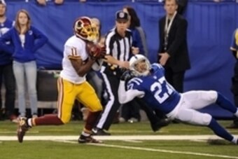 Nov 30, 2014; Indianapolis, IN, USA; Washington Redskins receiver DeSean Jackson (11) makes a touchdown catch against Indianapolis Colts cornerback Josh Gordy (27) at Lucas Oil Stadium. The Colts won, 49-27. Mandatory Credit: Thomas J. Russo-USA TODAY Spo