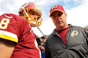 LANDOVER, MD - SEPTEMBER 14: Quarterback Kirk Cousins #8 of the Washington Redskins talks with head coach Jay Gruden after defeating the Jacksonville Jaguars at FedExField on September 14, 2014 in Landover, Maryland. (Photo by Patrick Smith/Getty Images)