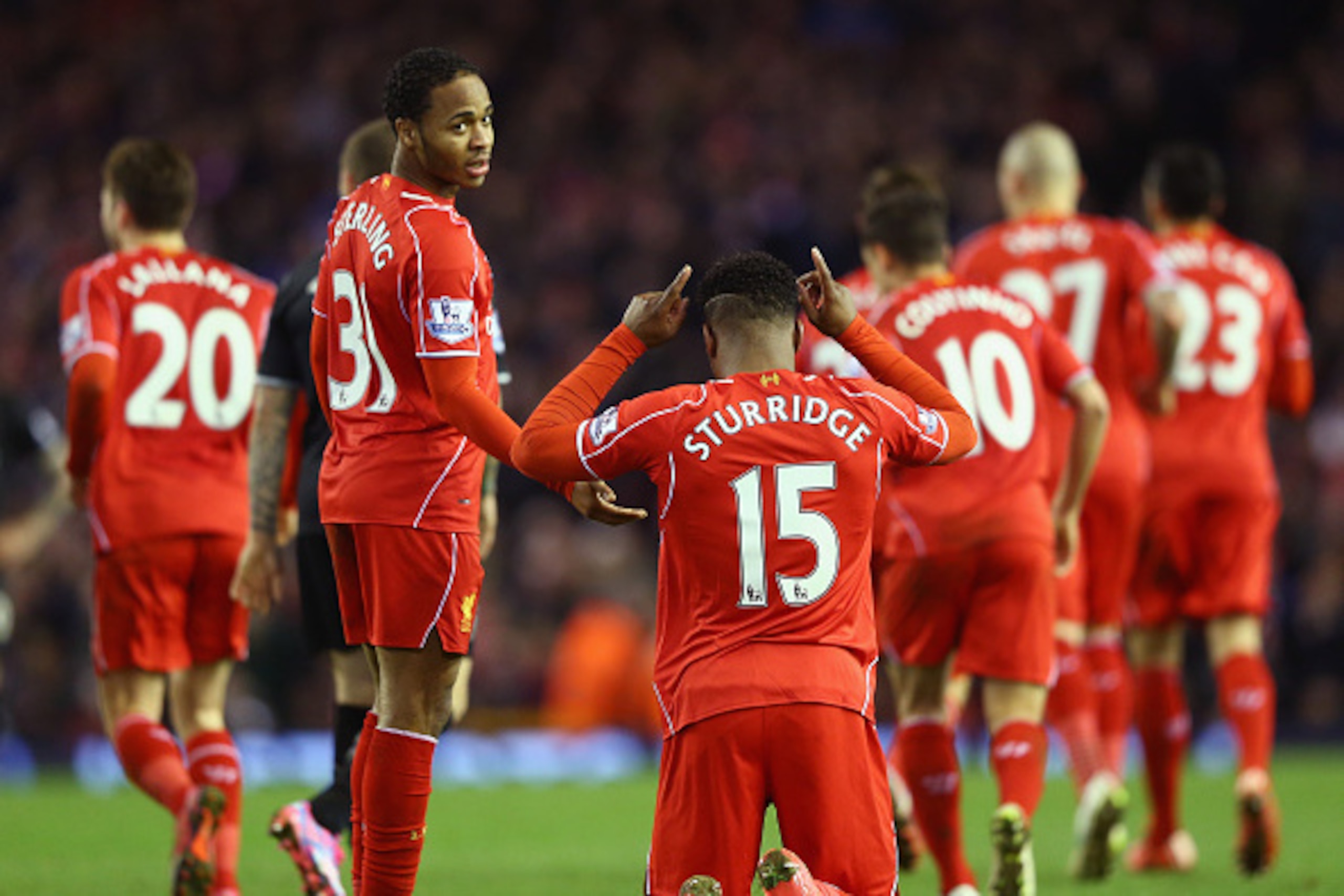 LIVERPOOL, ENGLAND - MARCH 04: Daniel Sturridge of Liverpool celebrates scoring their second goal during the Barclays Premier League match between Liverpool and Burnley at Anfield on March 4, 2015 in Liverpool, England.  (Photo by Michael Steele/Getty Ima