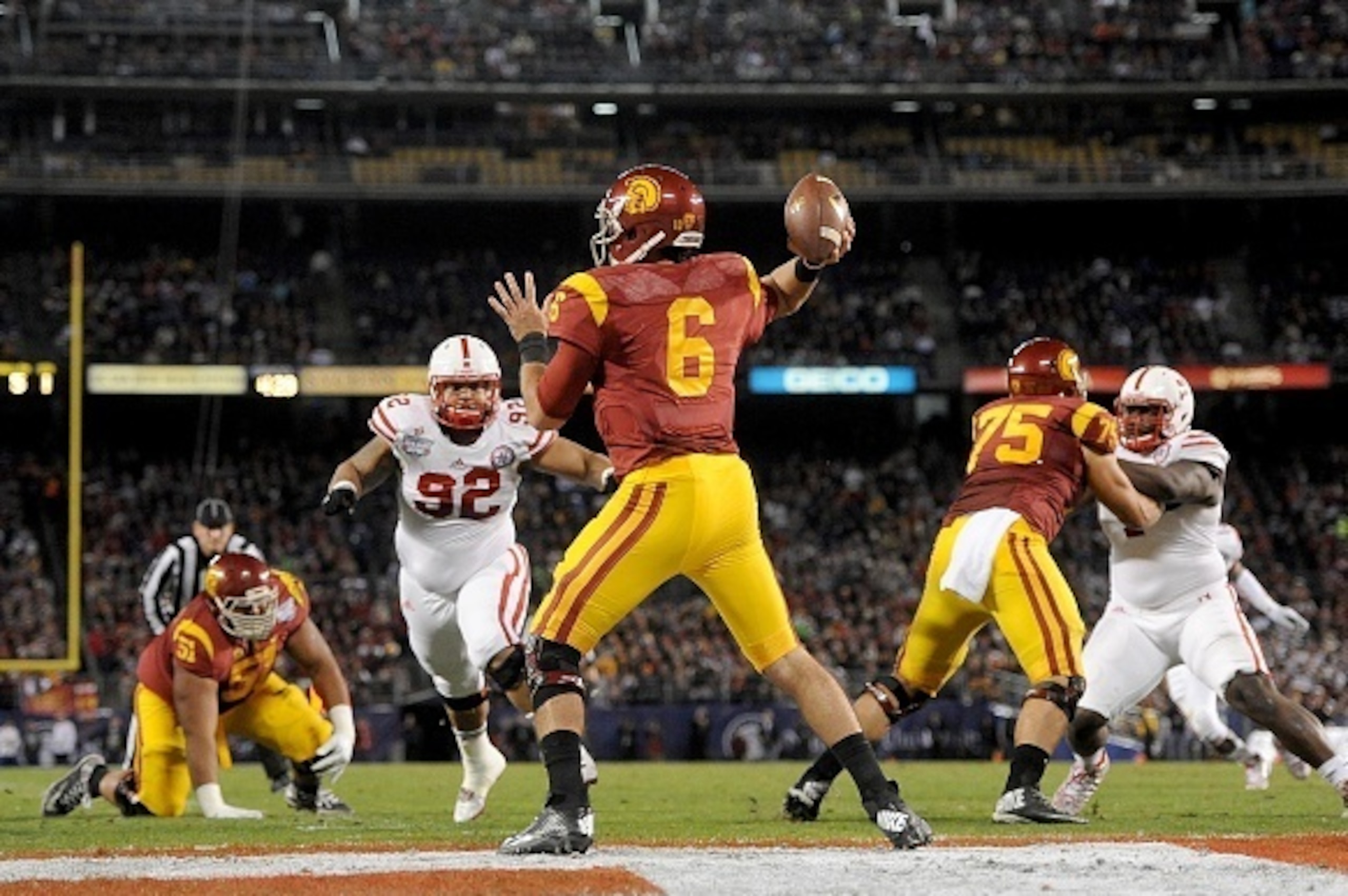 SAN DIEGO, CA-  DECEMBER 27: Quarterback Cody Kessler #6 of the USC Trojans throws the ball against the Nebraska Cornhuskers during the first half of the National University Holiday Bowl on December 27, 2014 at Qualcomm Stadium in San Diego, California. (