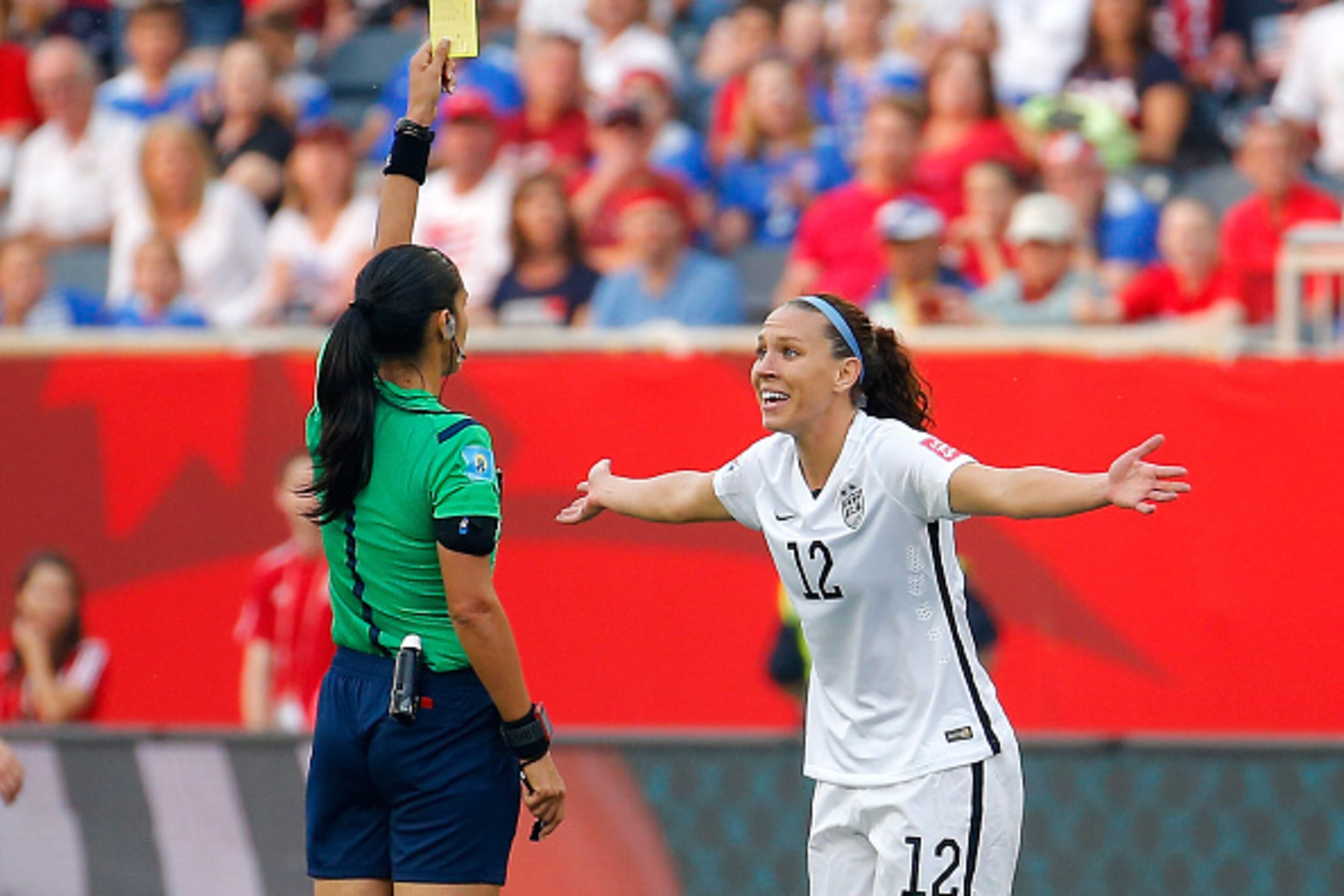 WINNIPEG, MB - JUNE 08:  Lauren Holiday #12 of United States receives a yellow card in the second half against Australia during the FIFA Women's World Cup 2015 Group D match at Winnipeg Stadium on June 8, 2015 in Winnipeg, Canada.  (Photo by Kevin C. Cox/