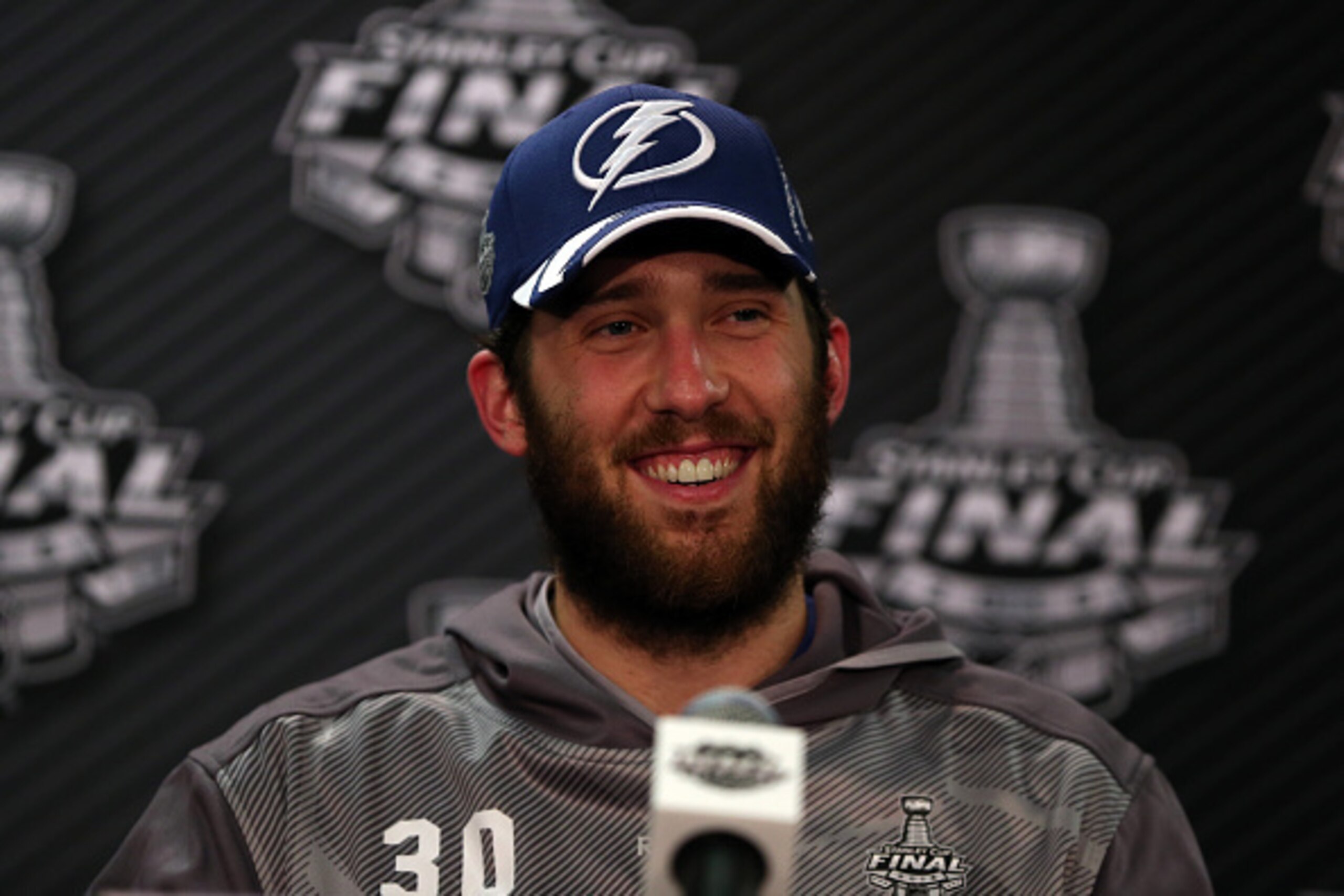 CHICAGO, IL - JUNE 08:  Ben Bishop #30 of the Tampa Bay Lightning speaks to the media after defeating the Chicago Blackhawks 3-2 in Game Three of the 2015 NHL Stanley Cup Final at the United Center on June 8, 2015 in Chicago, Illinois.  (Photo by Jonathan