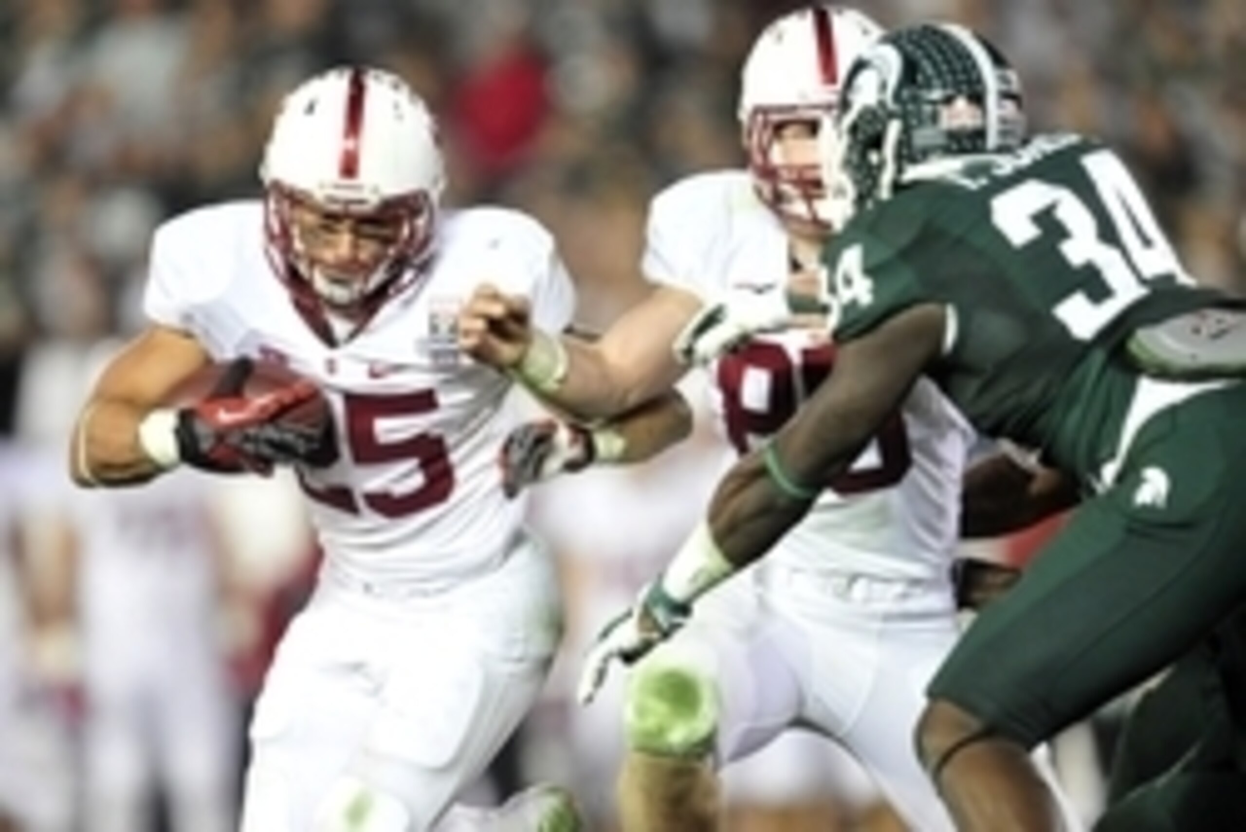 January 1, 2014; Pasadena, CA, USA; Stanford Cardinal running back Tyler Gaffney (25) runs the ball against the Michigan State Spartans during the second half at Rose Bowl. Mandatory Credit: Gary A. Vasquez-USA TODAY Sports
