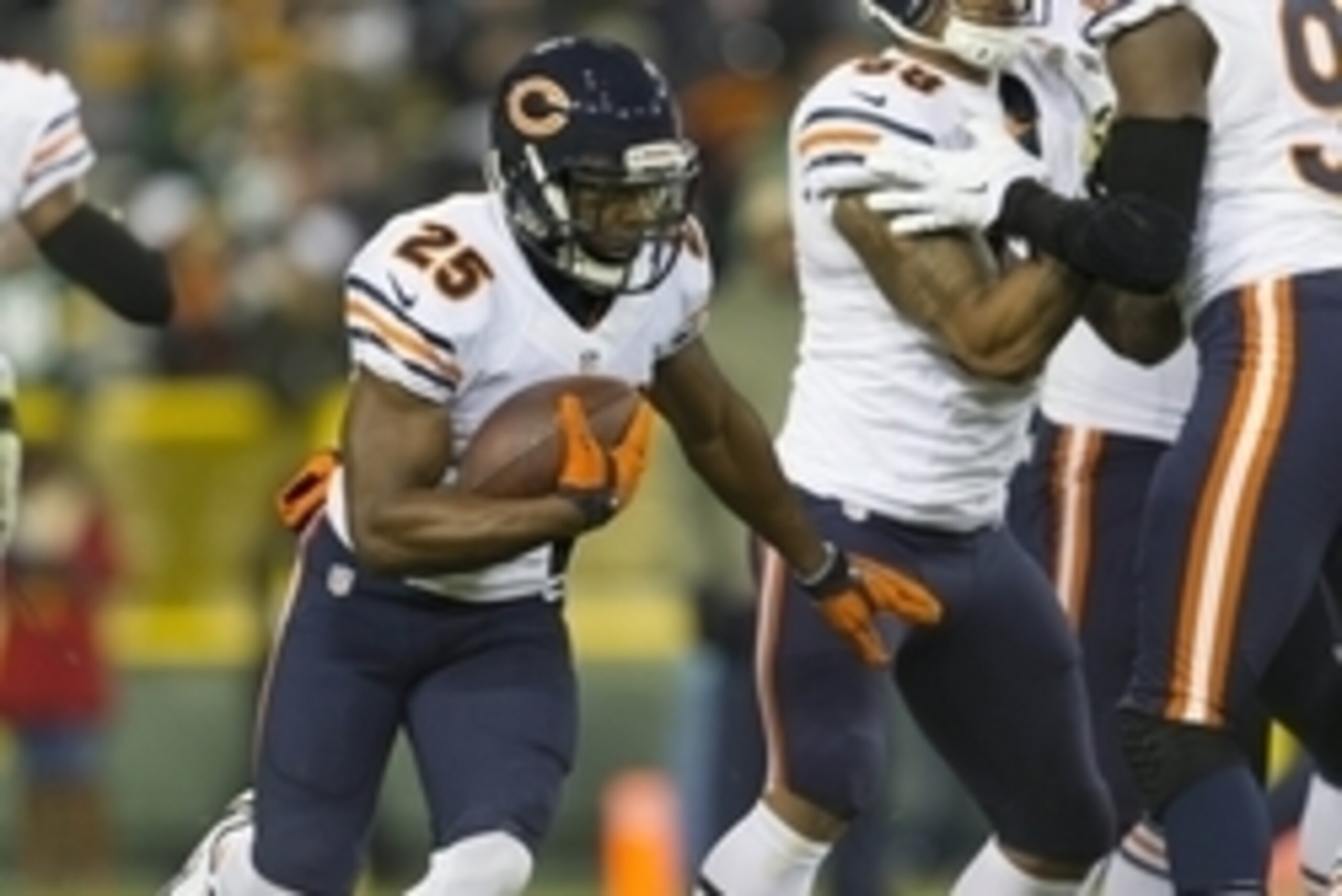 Nov 9, 2014; Green Bay, WI, USA; Chicago Bears running back Ka'Deem Carey (25) carries the football during warmups prior to the game against the Green Bay Packers at Lambeau Field. Mandatory Credit: Jeff Hanisch-USA TODAY Sports