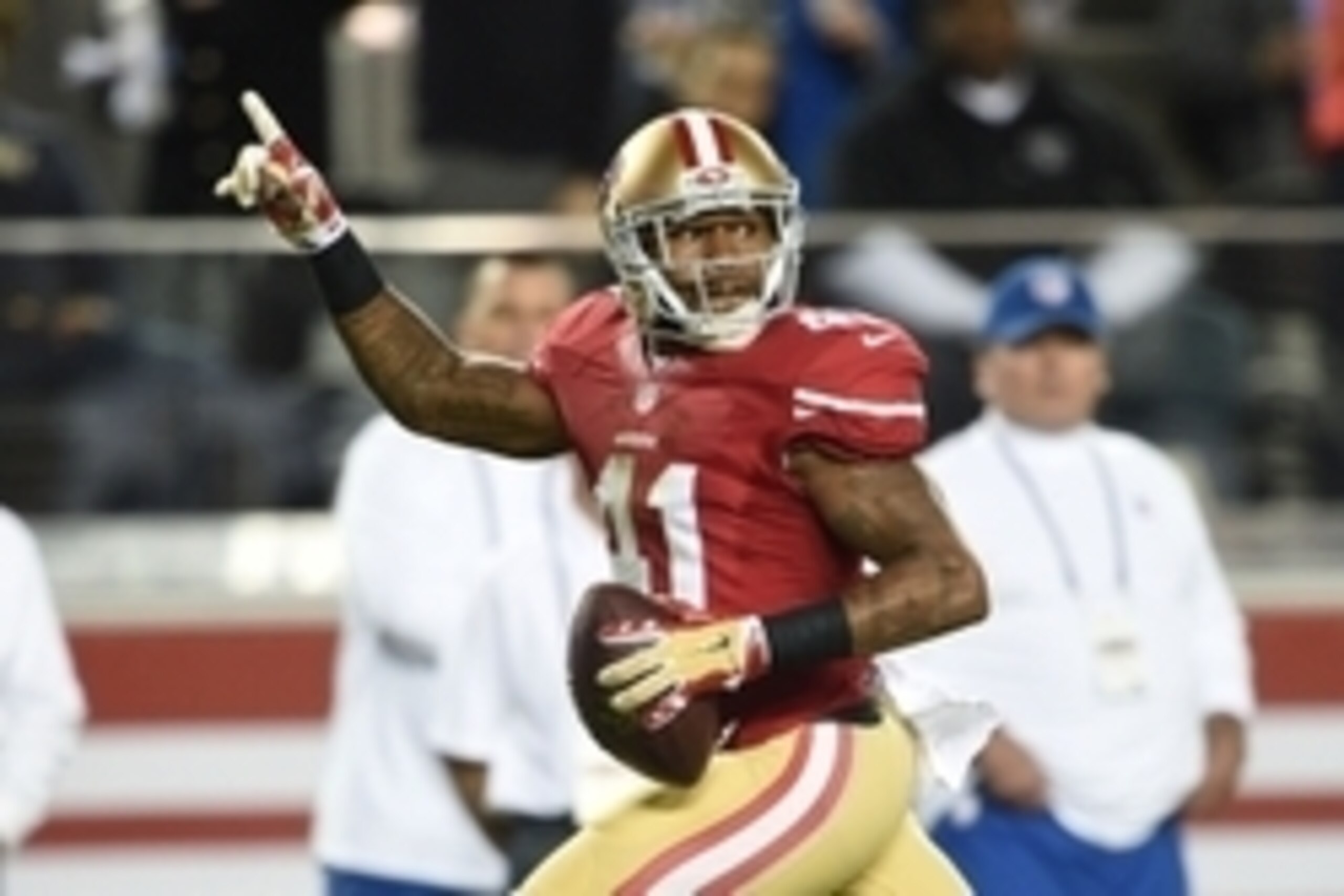 December 20, 2014; Santa Clara, CA, USA; San Francisco 49ers strong safety Antoine Bethea (41) celebrates scoring a touchdown off an interception during the second quarter against the San Diego Chargers at Levi's Stadium. Mandatory Credit: Kyle Terada-USA