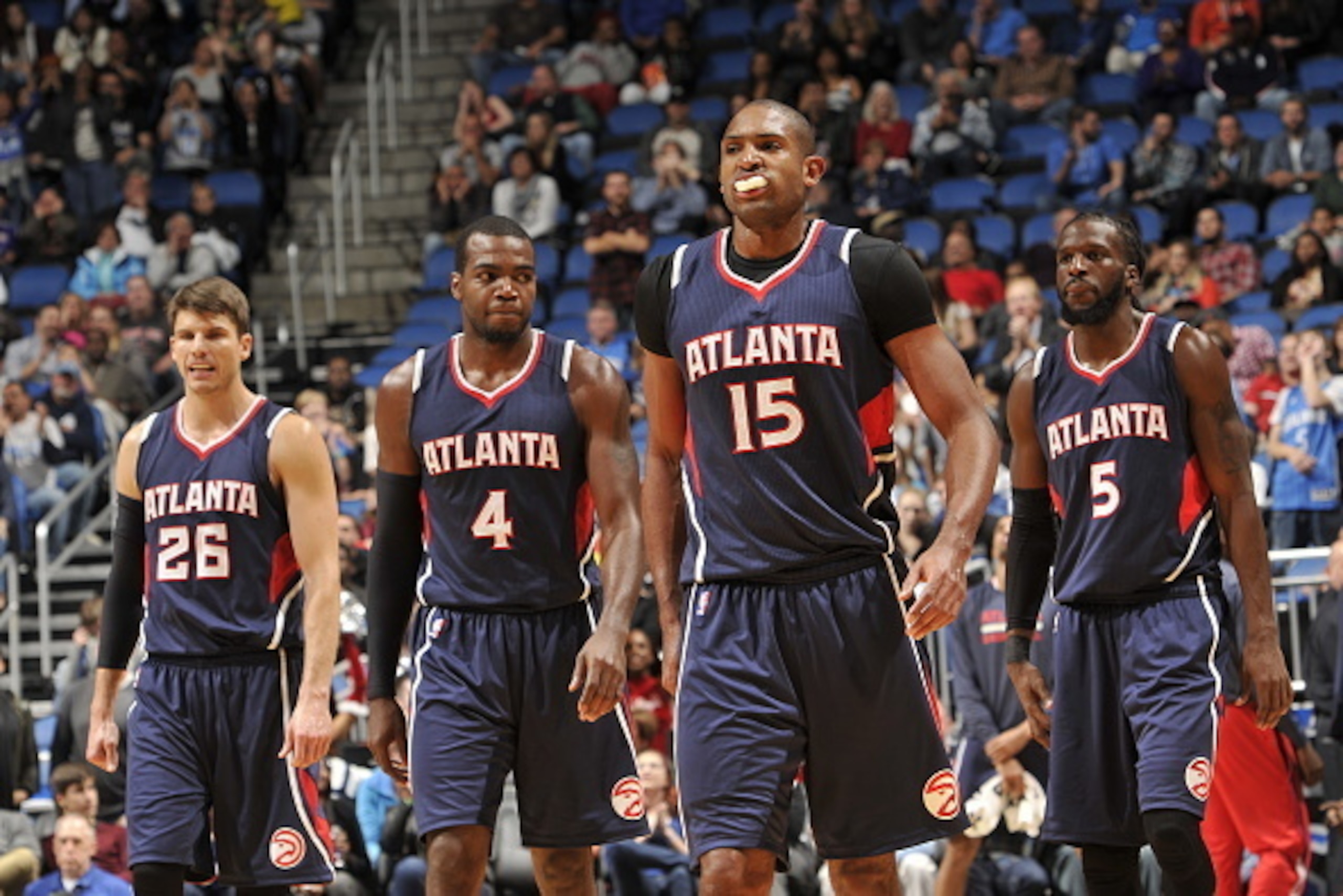 ORLANDO, FL - December 13: Kyle Korver #26, Paul Millsap #4 , Al Horford #15 and DeMarre Carroll #5 of the Atlanta Hawks during the game on December 13, 2014 at Amway Center in Orlando, Florida. NOTE TO USER: User expressly acknowledges and agrees that, b