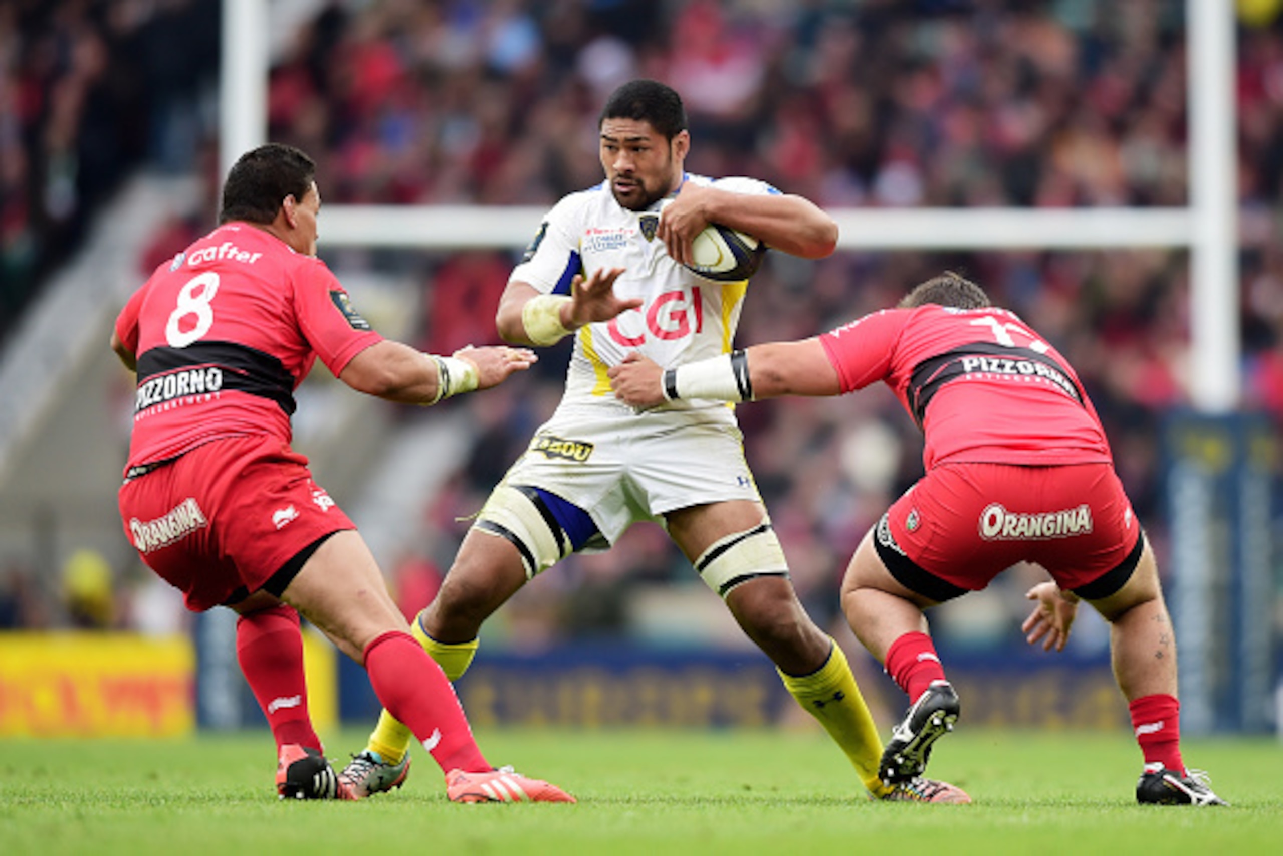 LONDON, ENGLAND - MAY 02:  Fritz Lee of Clermont is halted by Chris Masoe of Toulon and Alexandre Menini of Toulon during the European Rugby Champions Cup Final match between ASM Clermont Auvergne and RC Toulon at Twickenham Stadium on May 2, 2015 in Lond