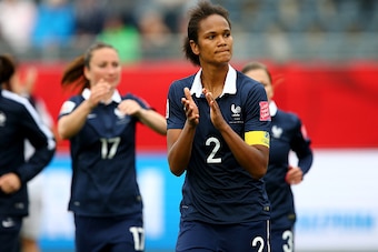 MONCTON, NB - JUNE 09:  Wendie Renard #2 of France and the rest of her teammates salute the fans after the match against England during the FIFA Women's World Cup 2015 Group F match at Moncton Stadium on June 9, 2015 in Moncton, Canada.  (Photo by Elsa/Ge