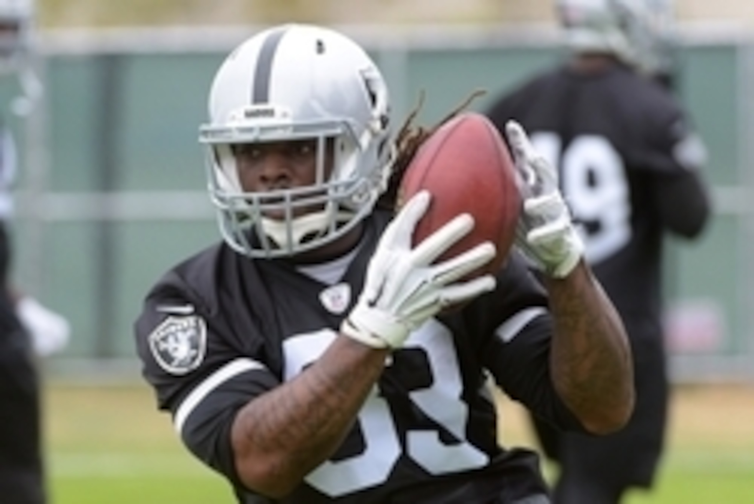 May 26, 2015; Alameda, CA, USA; Oakland Raiders running back Trent Richardson (33) catches a pass at organized team activities at the Raiders practice facility. Mandatory Credit: Kirby Lee-USA TODAY Sports May 26, 2015; Alameda, CA, USA; Oakland Raiders running back Trent Richardson (33) catches a pass at organized team activities at the Raiders practice facility. Mandatory Credit: Kirby Lee-USA TODAY Sports