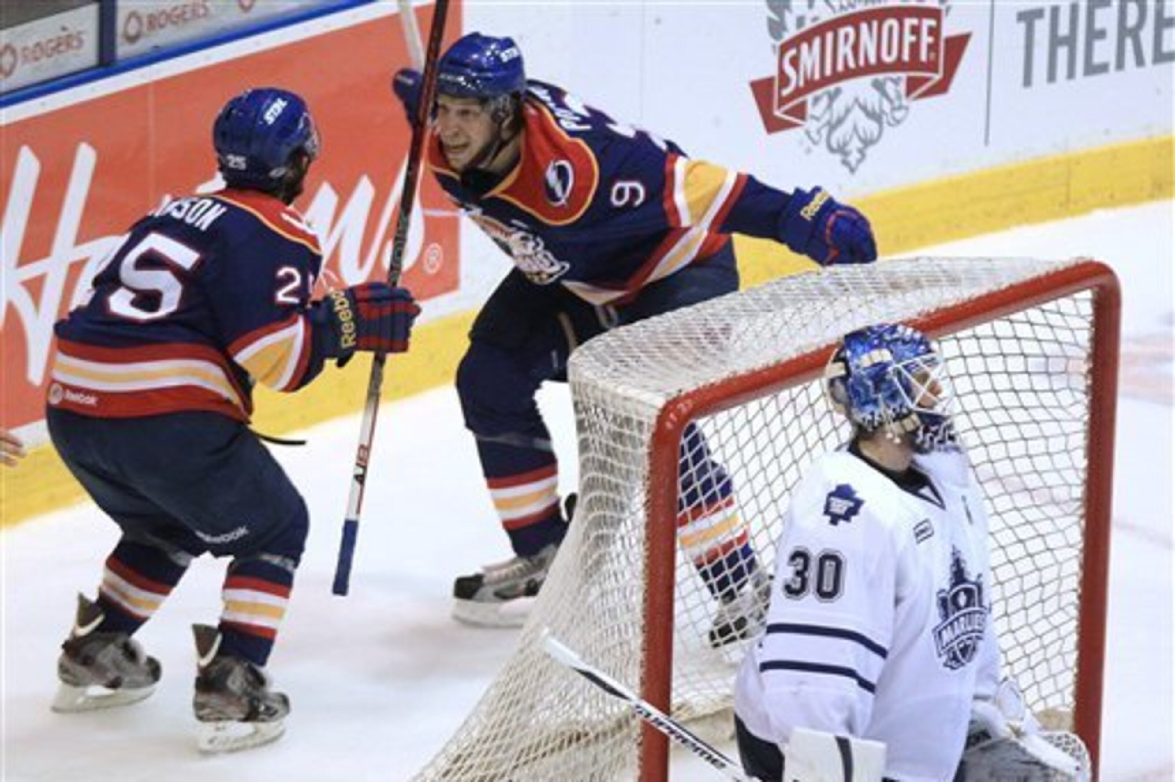 Tyler Johnson (far left) and a Norfolk Admirals teammate celebrate a goal during the 2012 AHL playoffs.