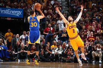 CLEVELAND, OH - JUNE 9:  Stephen Curry #30 of the Golden State Warriors shoots against Matthew Dellavedova #8 of the Cleveland Cavaliers during Game Three of the 2015 NBA Finals at The Quicken Loans Arena on June 9, 2015 in Cleveland, Ohio. NOTE TO USER: 
