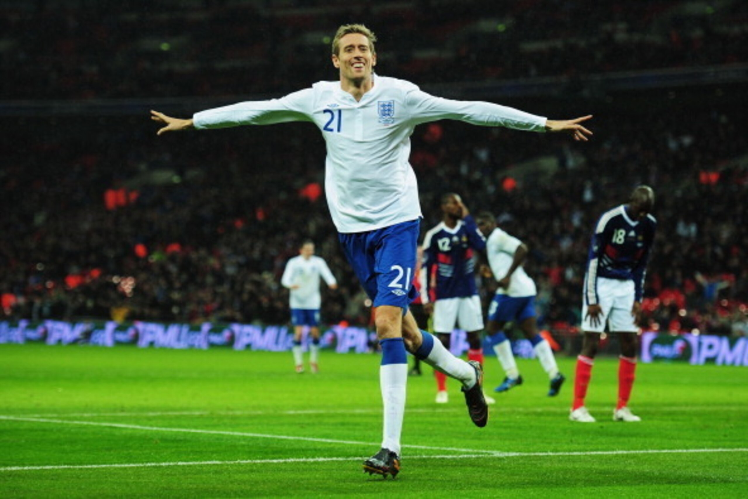 LONDON, ENGLAND - NOVEMBER 17: Peter Crouch of England celebrates as he scores their first goal during the international friendly match between England and France at Wembley Stadium on November 17, 2010 in London, England. (Photo by Shaun Botterill/Gett LONDON, ENGLAND - NOVEMBER 17: Peter Crouch of England celebrates as he scores their first goal during the international friendly match between England and France at Wembley Stadium on November 17, 2010 in London, England. (Photo by Shaun Botterill/Gett