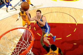 CLEVELAND, OH - JUNE 9: David Lee #10 of the Golden State Warriors shoots during Game Three of the 2015 NBA Finals at The Quicken Loans Arena on June 9, 2015 in Cleveland, Ohio. NOTE TO USER: User expressly acknowledges and agrees that, by downloading and