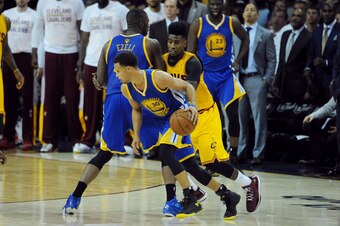 CLEVELAND, OH - JUNE 9: Stephen Curry #30 of the Golden State Warriors handles the ball against the Cleveland Cavaliers in Game Three of the 2015 NBA Finals on June 9, 2015 at The Quicken Loans Arena in Cleveland, OH. NOTE TO USER: User expressly acknowle