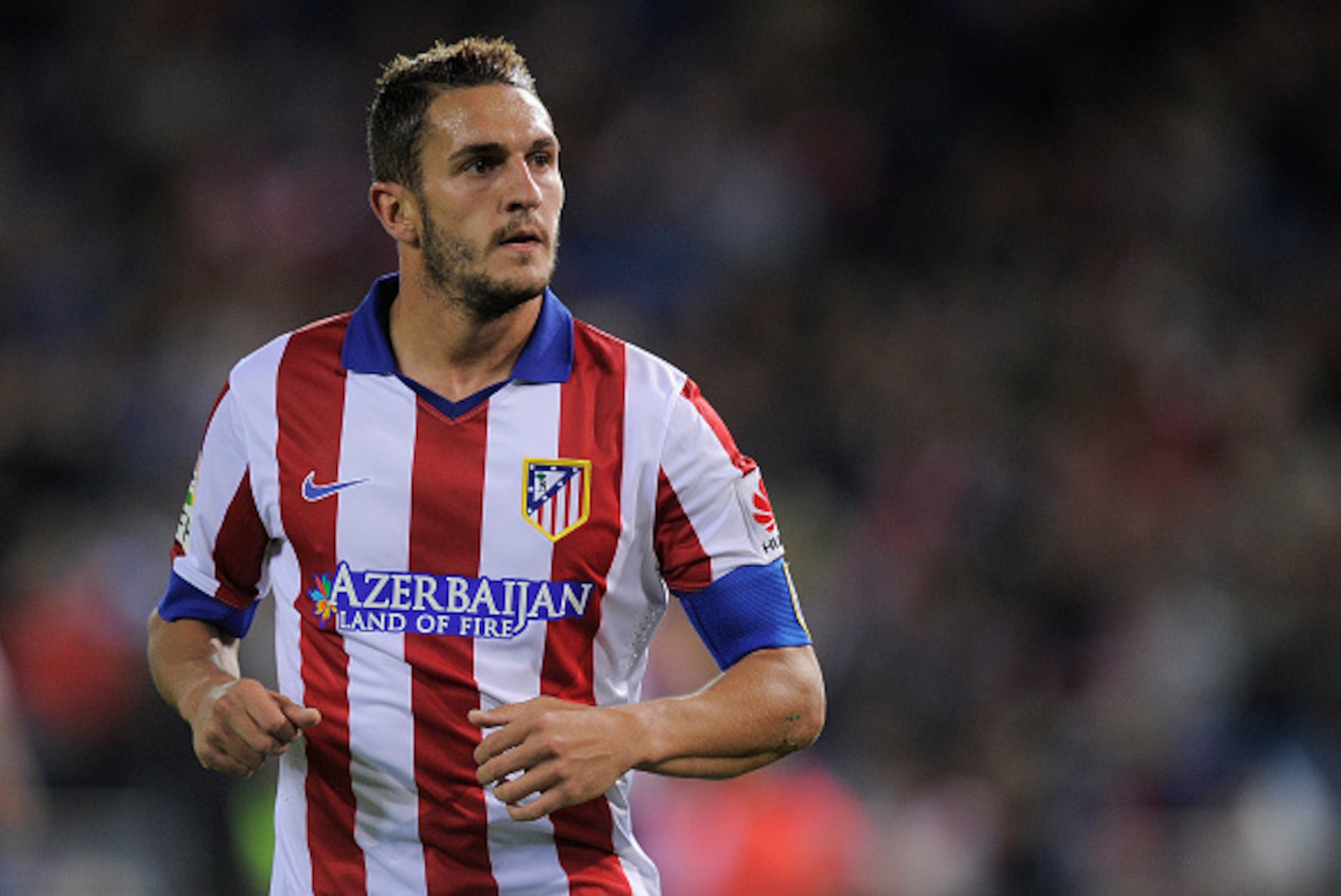 MADRID, SPAIN - APRIL 07:  Koke Resurreccion of Club Atletico de Madrid looks on during the La Liga match between Club Atletico de Madrid and Real Sociedad at Vicente Calderon Stadium on April 7, 2015 in Madrid, Spain.  (Photo by Denis Doyle/Getty Images)