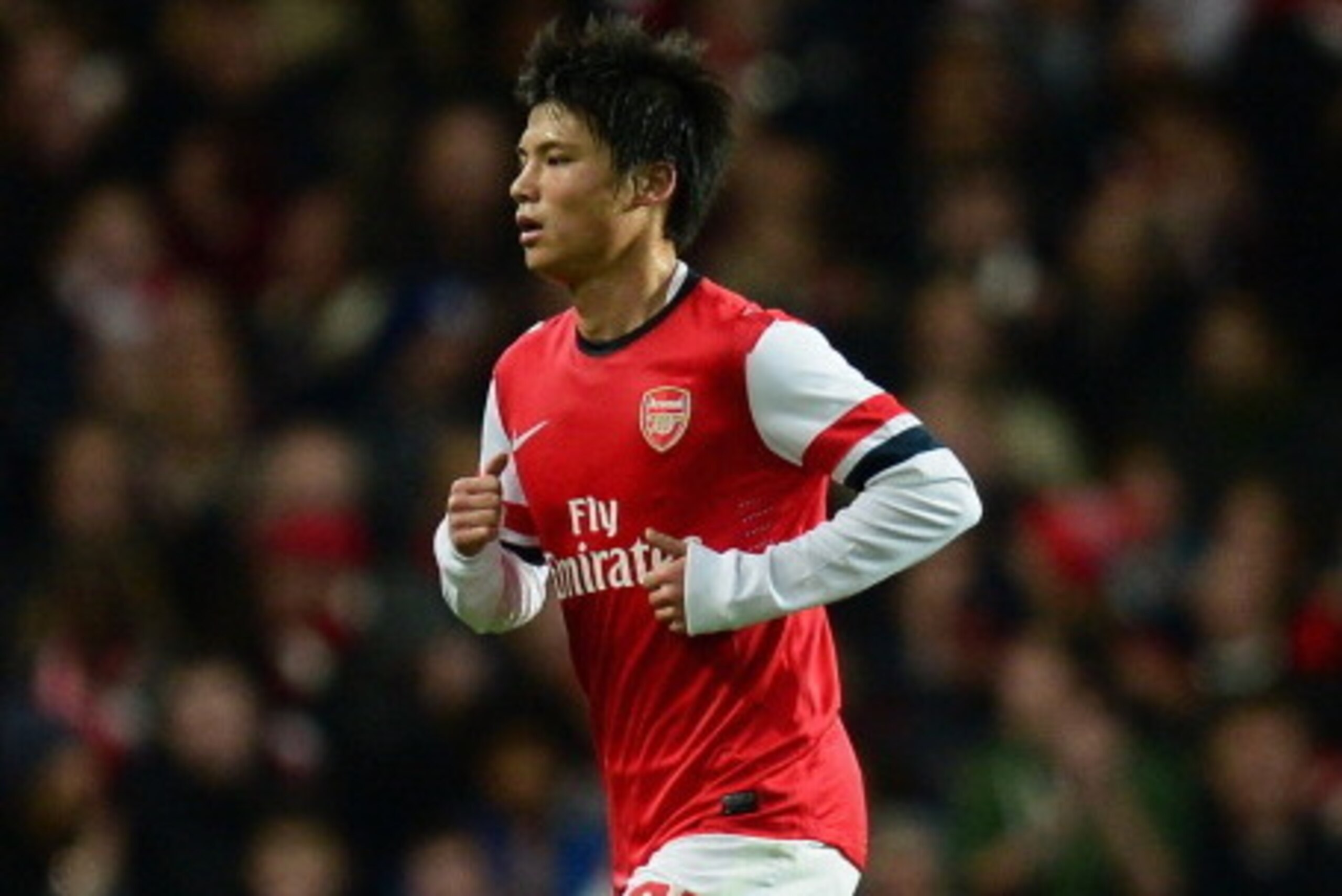 LONDON, ENGLAND - OCTOBER 29:  Ryo Miyaichi of Arsenal leaves the pitch after being substituted during the Capital One Cup Fourth Round match between Arsenal and Chelsea at the Emirates Stadium on October 29, 2013 in London, England.  (Photo by Jamie McDo