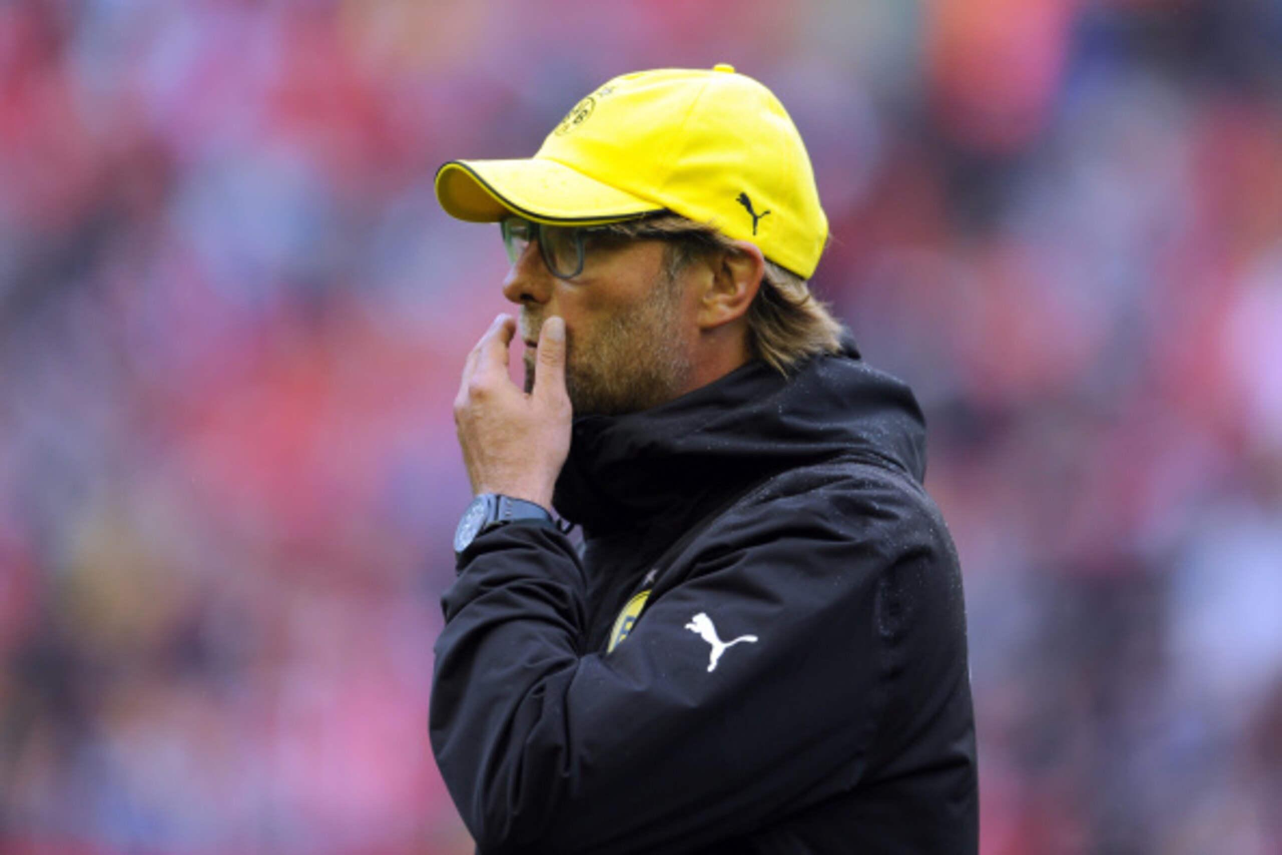 LIVERPOOL, ENGLAND - AUGUST 10:  Jurgen Klopp manager of Borussia Dortmund during the Pre Season Friendly match between Liverpool and Borussia Dortmund at Anfield on August 10, 2014 in Liverpool, England. (Photo by Clint Hughes/Getty Images)