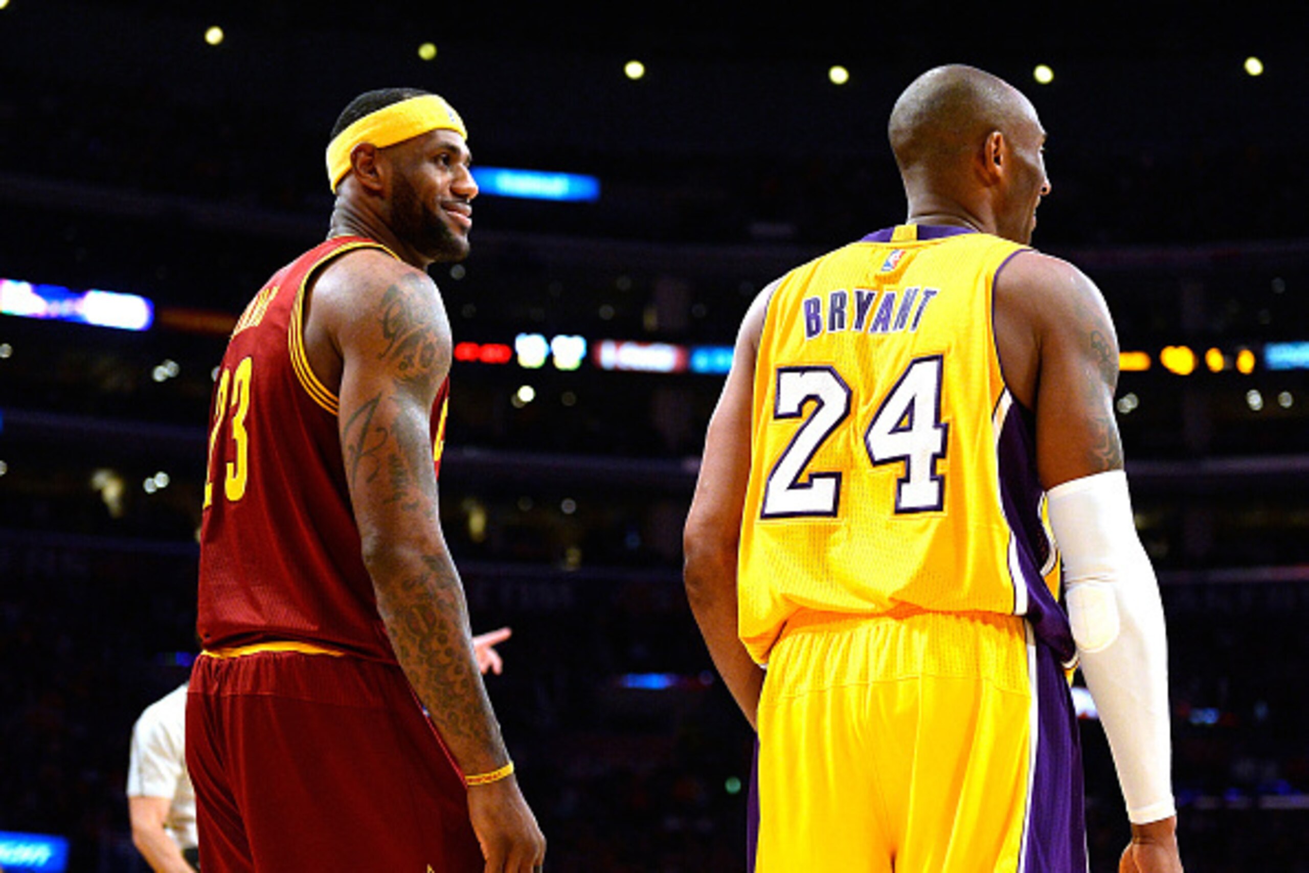 LOS ANGELES, CA - JANUARY 15:  LeBron James #23 of the Cleveland Cavaliers laughs with Kobe Bryant #24 of the Los Angeles Lakers during a 109-102 Cavalier win at Staples Center on January 15, 2015 in Los Angeles, California.  NOTE TO USER: User expressly 
