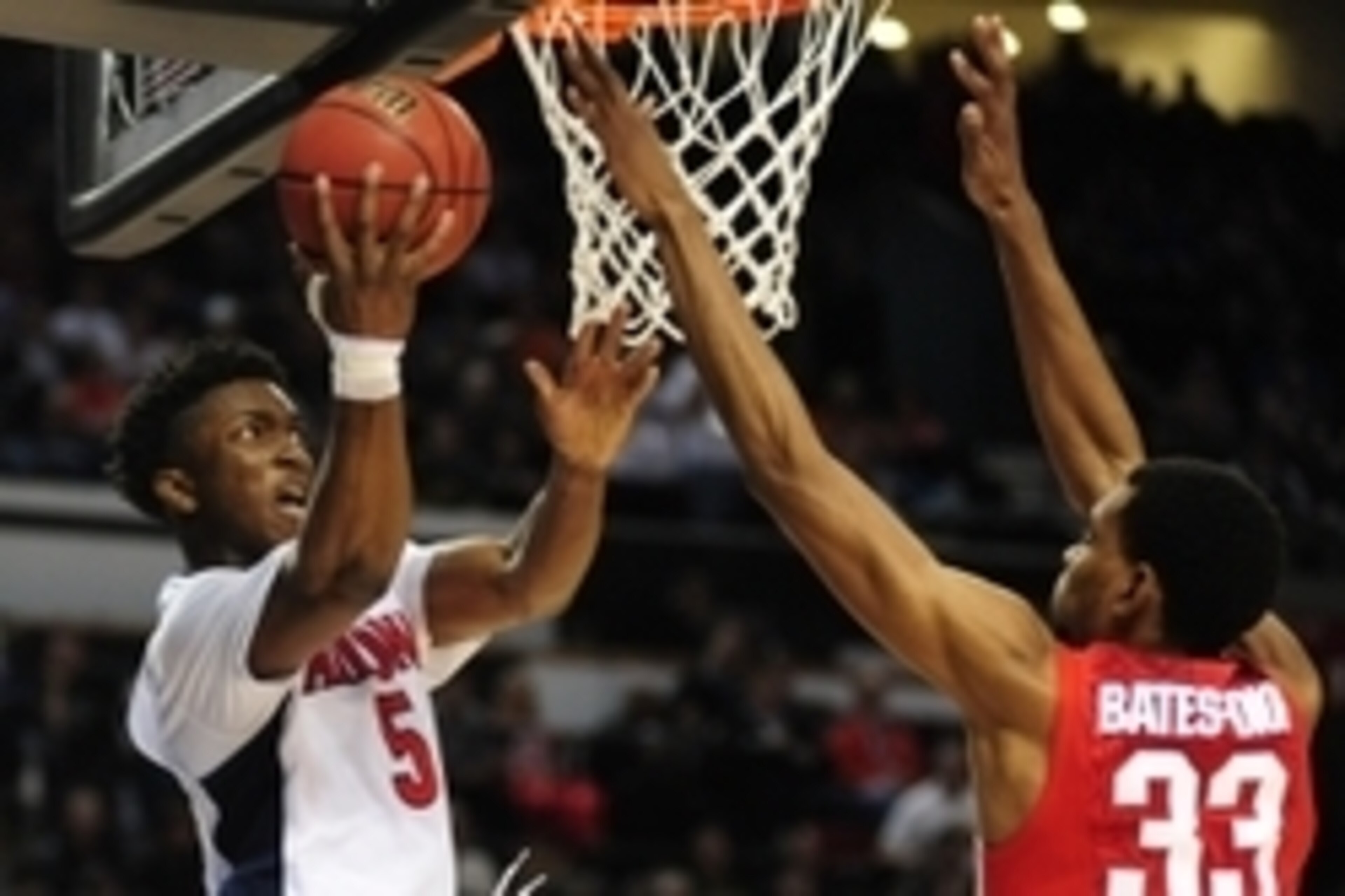 Mar 21, 2015; Portland, OR, USA; Arizona Wildcats forward Stanley Johnson (5) shoots the basketball against Ohio State Buckeyes forward Keita Bates-Diop (33) during the second half in the third round of the 2015 NCAA Tournament at Moda Center. The Wildcat