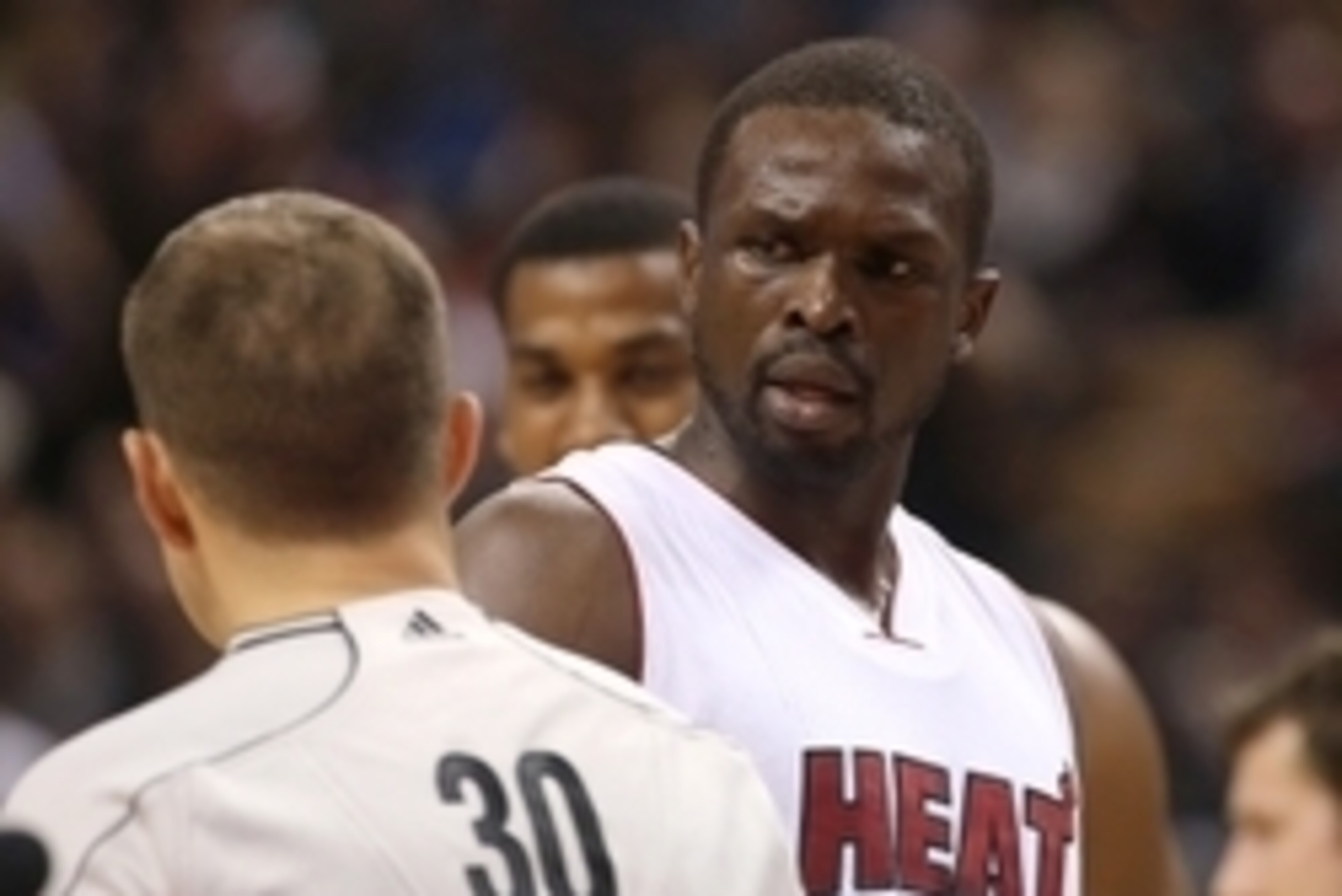 Mar 13, 2015; Toronto, Ontario, CAN; Miami Heat forward Luol Deng (9) reacts to a call to referee John Goble (30) against the Toronto Raptors at Air Canada Centre. The Raptors beat the Heat 102-92. Mandatory Credit: Tom Szczerbowski-USA TODAY Sports