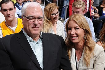 LOS ANGELES, CA - MARCH 12: Phil Jackson, President of the New York Knicks and Jeanie Buss, President of the Los Angeles Lakers pose for a photo at STAPLES Center on March 12, 2015 in Los Angeles, California. NOTE TO USER: User expressly acknowledges and 